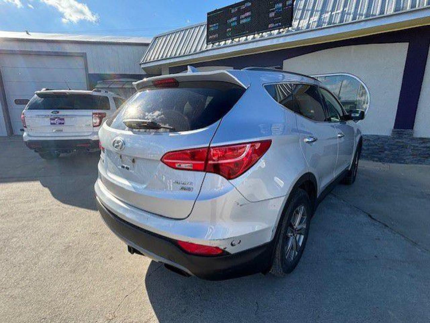 2016 SILVER HYUNDAI SANTA FE SPORT (5XYZUDLB5GG) with an 2.4L engine, Automatic transmission, located at 1100 W. Sheridan Ave., Shenandoah, 51601, (712) 246-1600, 40.765678, -95.388817 - Photo#1