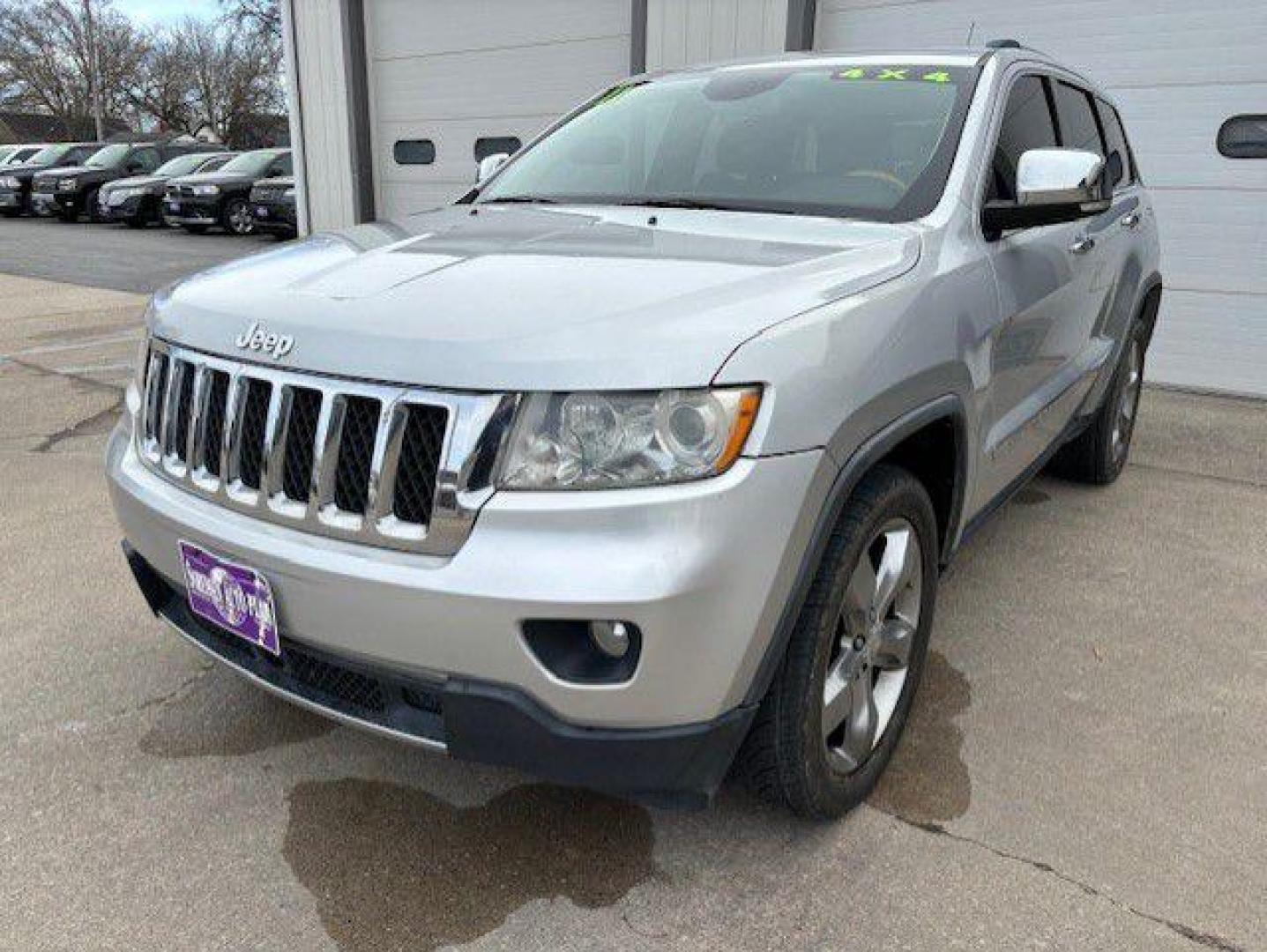 2011 SILVER JEEP GRAND CHEROKEE OVERLAND (1J4RR6GTXBC) with an 5.7L engine, Automatic transmission, located at 1100 W. Sheridan Ave., Shenandoah, 51601, (712) 246-1600, 40.765678, -95.388817 - Photo#0