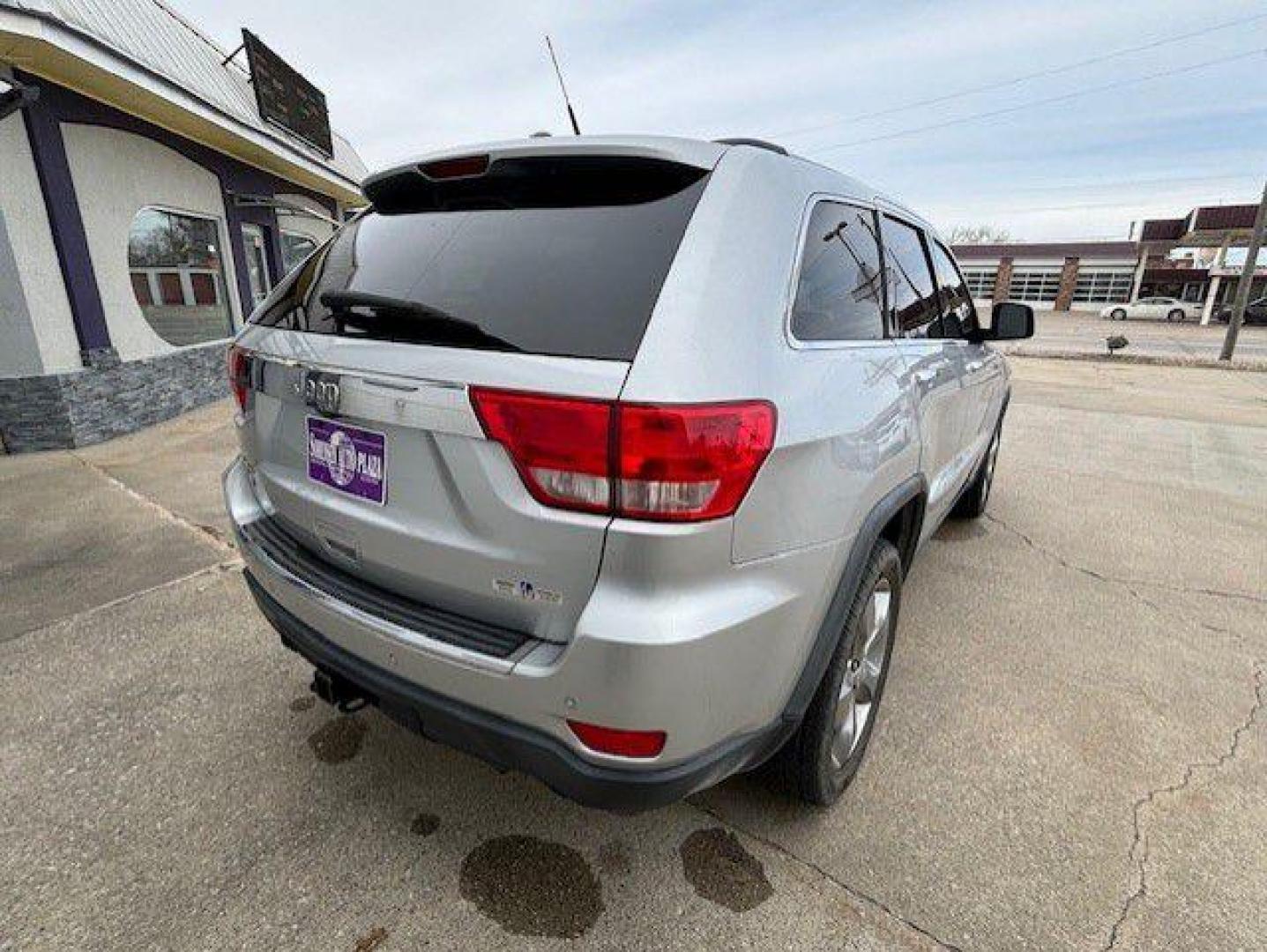 2011 SILVER JEEP GRAND CHEROKEE OVERLAND (1J4RR6GTXBC) with an 5.7L engine, Automatic transmission, located at 1100 W. Sheridan Ave., Shenandoah, 51601, (712) 246-1600, 40.765678, -95.388817 - Photo#1