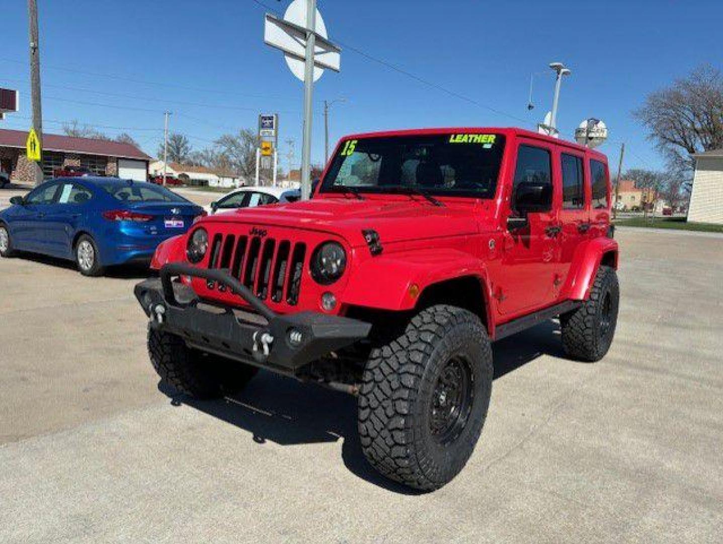 2015 RED JEEP WRANGLER UNLIMI SAHARA (1C4BJWEG2FL) with an 3.6L engine, Automatic transmission, located at 1100 W. Sheridan Ave., Shenandoah, 51601, (712) 246-1600, 40.765678, -95.388817 - Photo#0