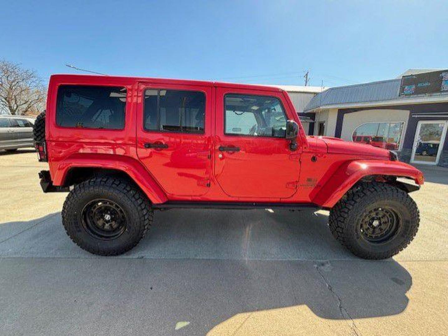 2015 RED JEEP WRANGLER UNLIMI SAHARA (1C4BJWEG2FL) with an 3.6L engine, Automatic transmission, located at 1100 W. Sheridan Ave., Shenandoah, 51601, (712) 246-1600, 40.765678, -95.388817 - Photo#6