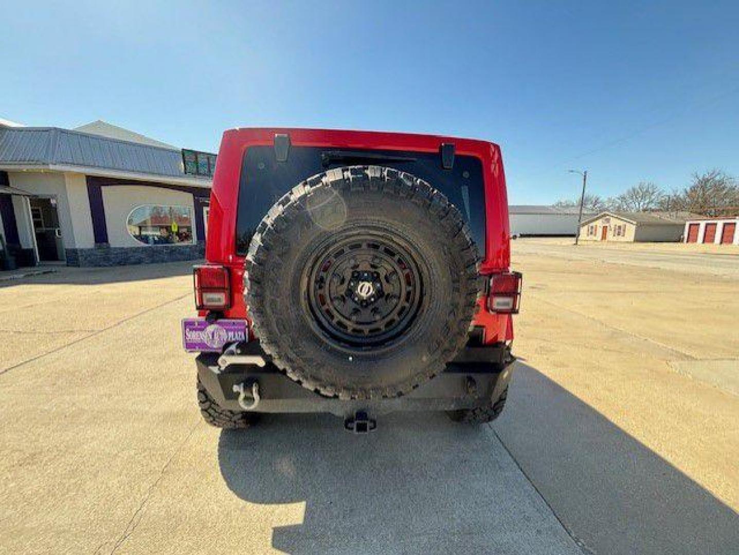 2015 RED JEEP WRANGLER UNLIMI SAHARA (1C4BJWEG2FL) with an 3.6L engine, Automatic transmission, located at 1100 W. Sheridan Ave., Shenandoah, 51601, (712) 246-1600, 40.765678, -95.388817 - Photo#8