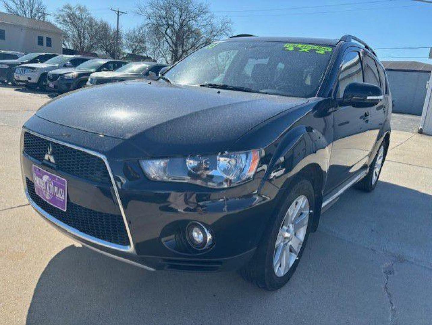 2011 BLACK MITSUBISHI OUTLANDER SE (JA4JT3AW6BU) with an 2.4L engine, Continuously Variable transmission, located at 1100 W. Sheridan Ave., Shenandoah, 51601, (712) 246-1600, 40.765678, -95.388817 - Photo#0