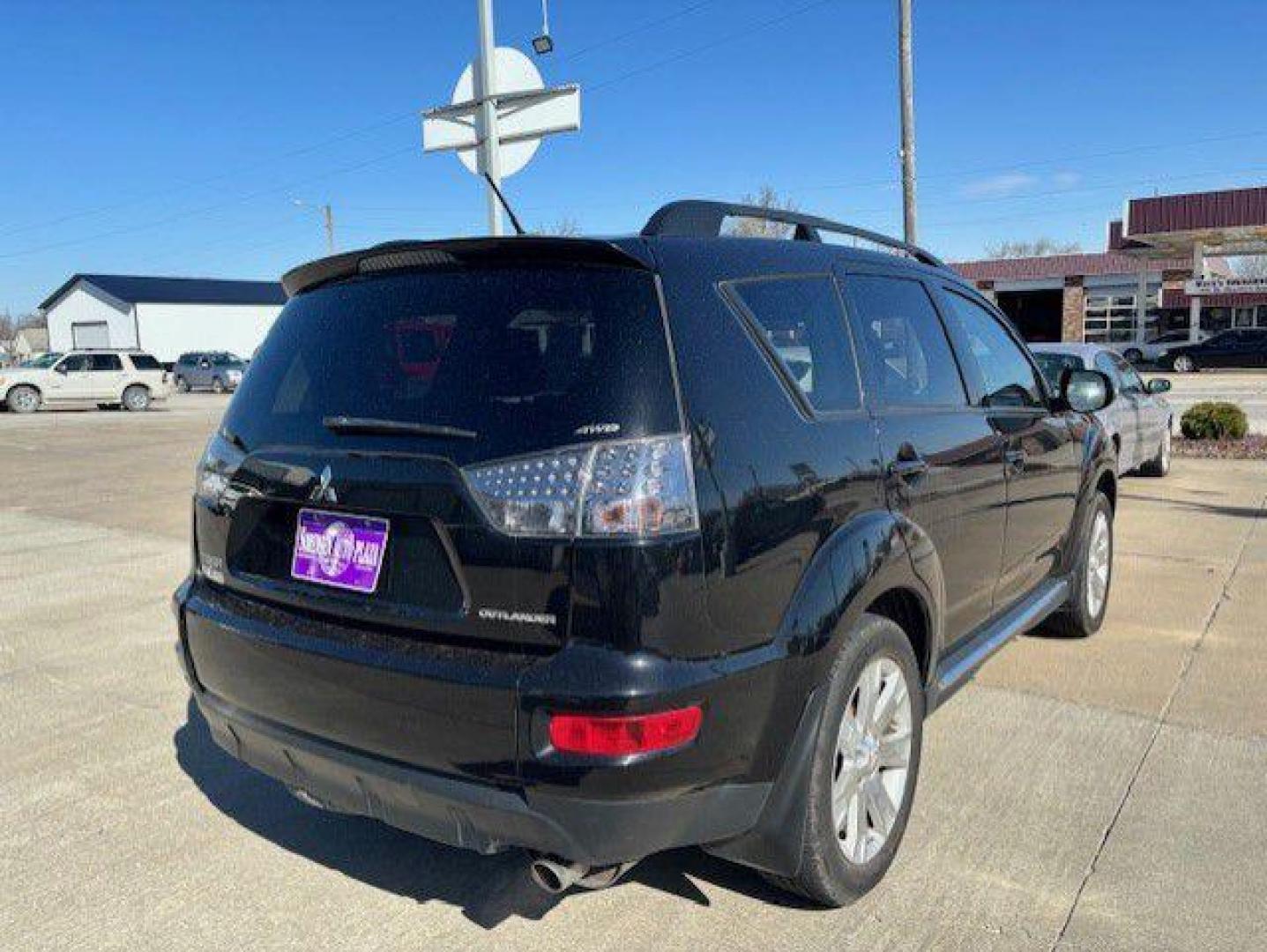 2011 BLACK MITSUBISHI OUTLANDER SE (JA4JT3AW6BU) with an 2.4L engine, Continuously Variable transmission, located at 1100 W. Sheridan Ave., Shenandoah, 51601, (712) 246-1600, 40.765678, -95.388817 - Photo#1