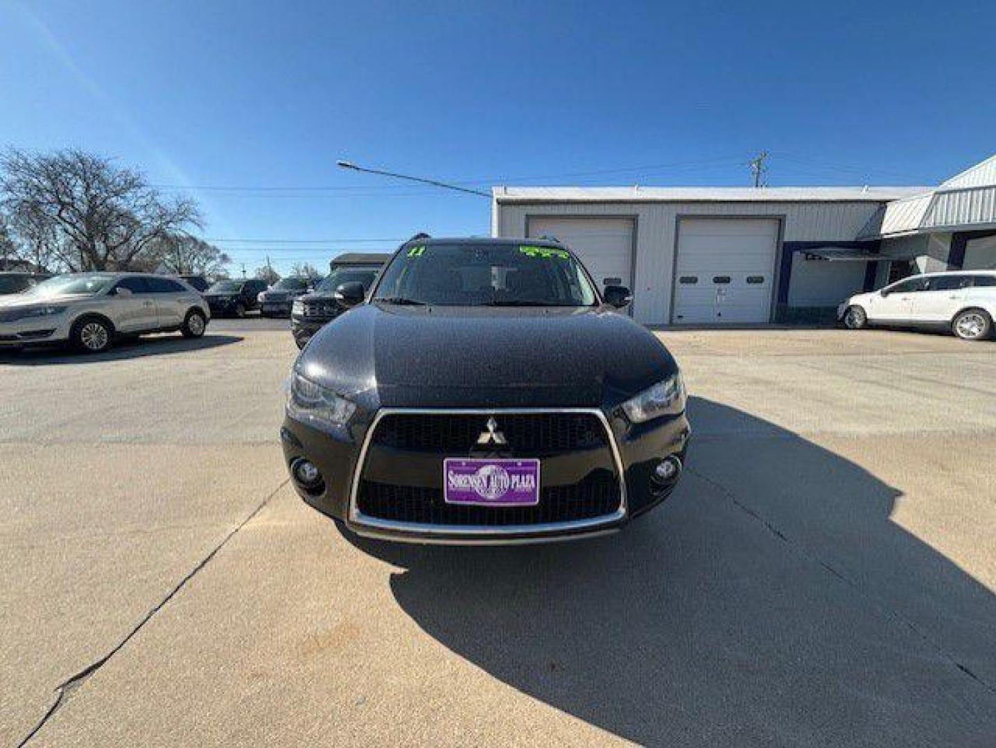 2011 BLACK MITSUBISHI OUTLANDER SE (JA4JT3AW6BU) with an 2.4L engine, Continuously Variable transmission, located at 1100 W. Sheridan Ave., Shenandoah, 51601, (712) 246-1600, 40.765678, -95.388817 - Photo#7