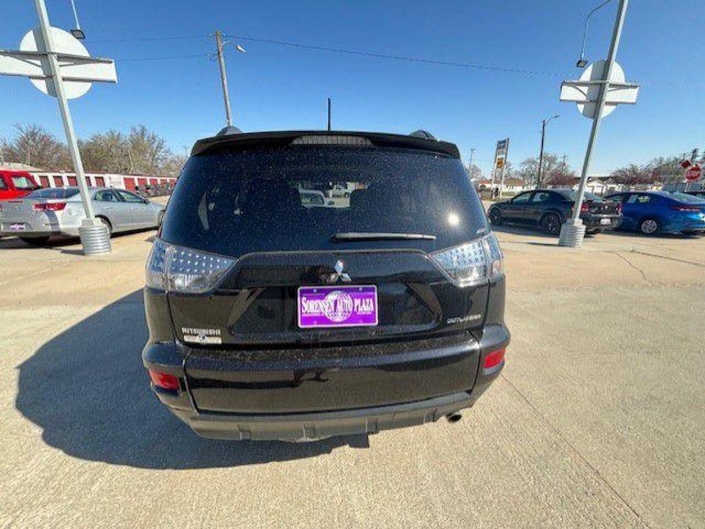 2011 BLACK MITSUBISHI OUTLANDER SE (JA4JT3AW6BU) with an 2.4L engine, Continuously Variable transmission, located at 1100 W. Sheridan Ave., Shenandoah, 51601, (712) 246-1600, 40.765678, -95.388817 - Photo#8