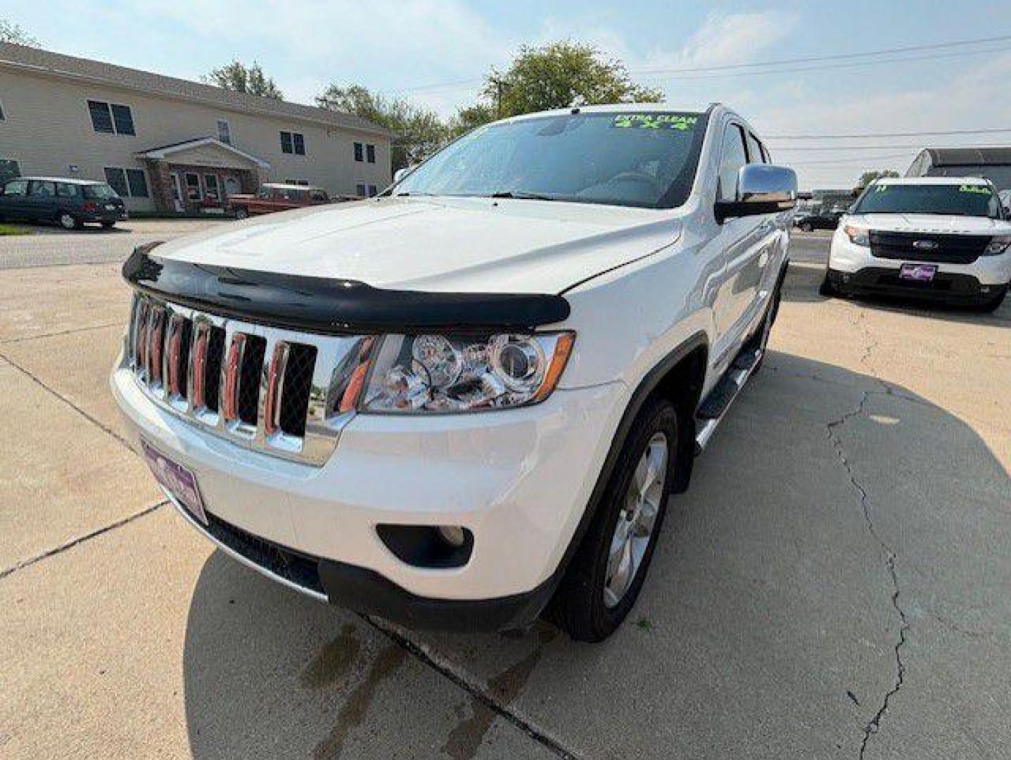 2012 WHITE JEEP GRAND CHEROKEE OVERLAND (1C4RJFCT3CC) with an 5.7L engine, Automatic transmission, located at 1100 W. Sheridan Ave., Shenandoah, 51601, (712) 246-1600, 40.765678, -95.388817 - Photo#0