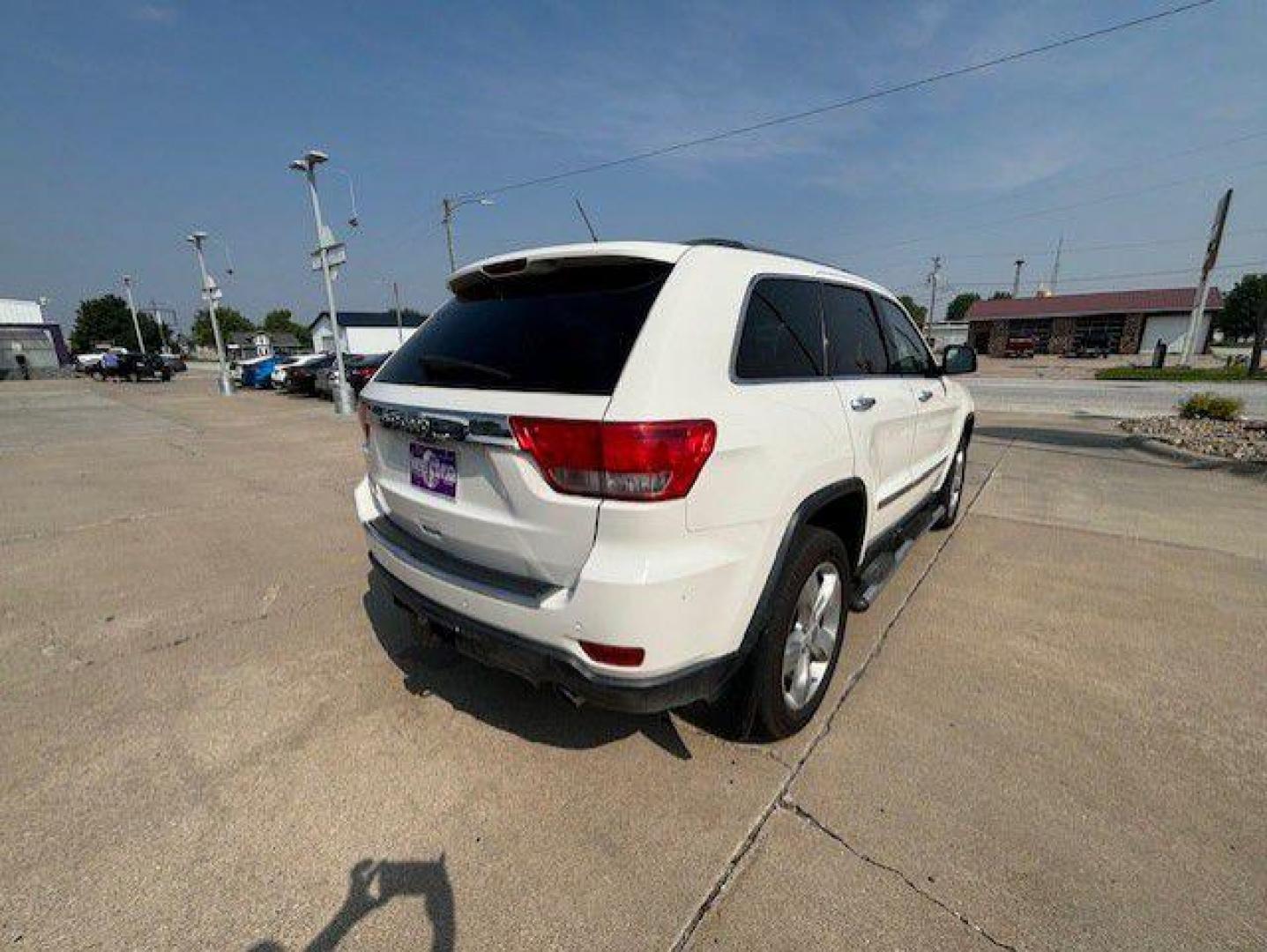 2012 WHITE JEEP GRAND CHEROKEE OVERLAND (1C4RJFCT3CC) with an 5.7L engine, Automatic transmission, located at 1100 W. Sheridan Ave., Shenandoah, 51601, (712) 246-1600, 40.765678, -95.388817 - Photo#1