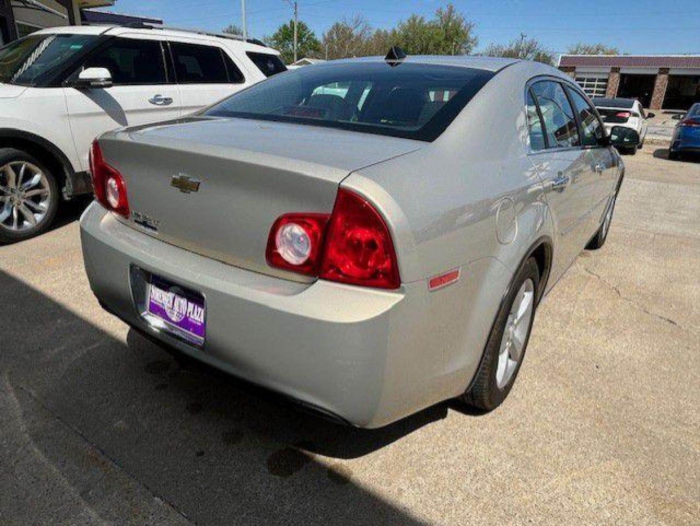 2012 GOLD CHEVROLET MALIBU 1LT (1G1ZC5E00CF) with an 2.4L engine, Automatic transmission, located at 1100 W. Sheridan Ave., Shenandoah, 51601, (712) 246-1600, 40.765678, -95.388817 - Photo#1