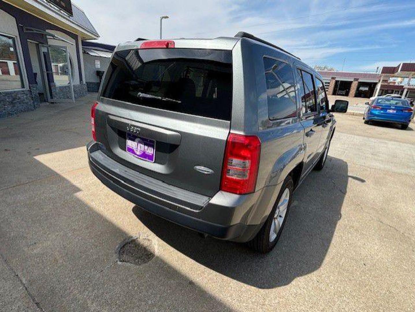 2014 GRAY JEEP PATRIOT LATITUDE (1C4NJPFA2ED) with an 2.0L engine, Continuously Variable transmission, located at 1100 W. Sheridan Ave., Shenandoah, 51601, (712) 246-1600, 40.765678, -95.388817 - Photo#1