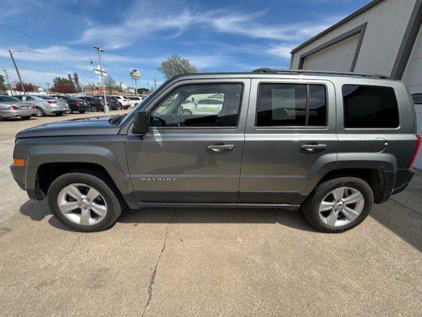 2014 GRAY JEEP PATRIOT LATITUDE (1C4NJPFA2ED) with an 2.0L engine, Continuously Variable transmission, located at 1100 W. Sheridan Ave., Shenandoah, 51601, (712) 246-1600, 40.765678, -95.388817 - Photo#2