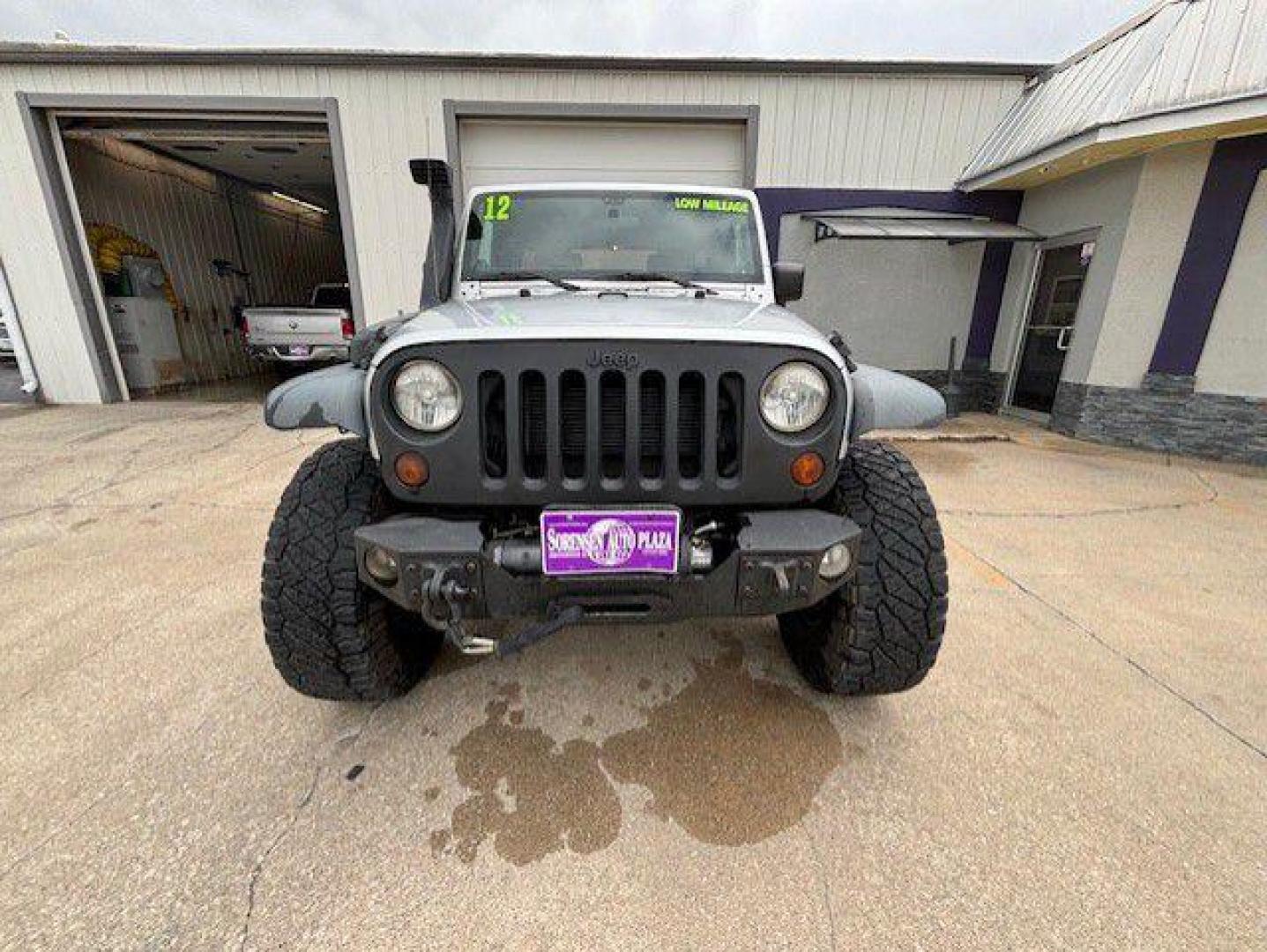 2012 SILVER JEEP WRANGLER UNLIMI SPORT (1C4BJWDG9CL) with an 3.6L engine, Automatic transmission, located at 1100 W. Sheridan Ave., Shenandoah, 51601, (712) 246-1600, 40.765678, -95.388817 - Photo#8