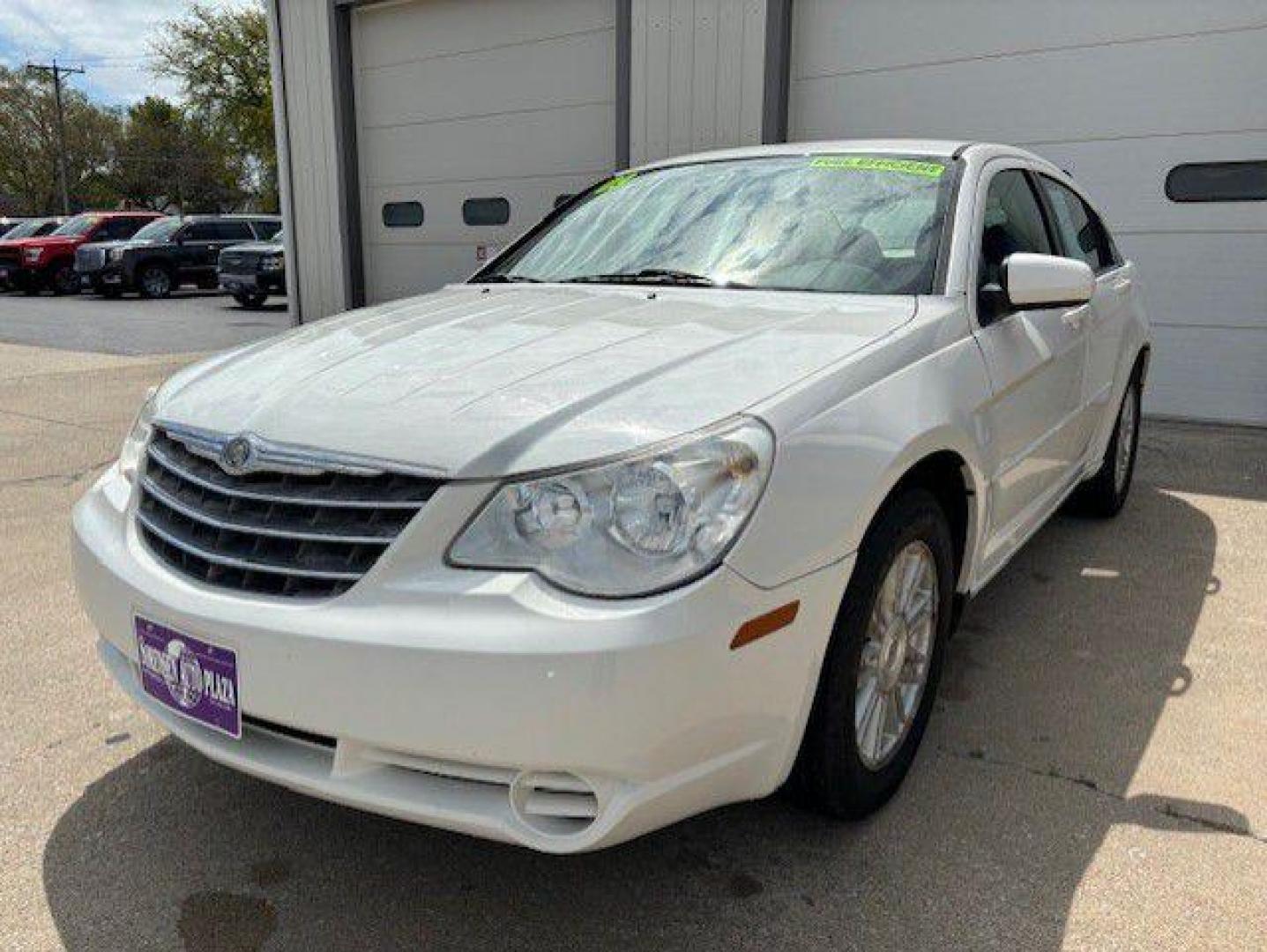 2009 WHITE CHRYSLER SEBRING TOURING (1C3LC56B19N) with an 2.4L engine, Automatic transmission, located at 1100 W. Sheridan Ave., Shenandoah, 51601, (712) 246-1600, 40.765678, -95.388817 - Photo#0