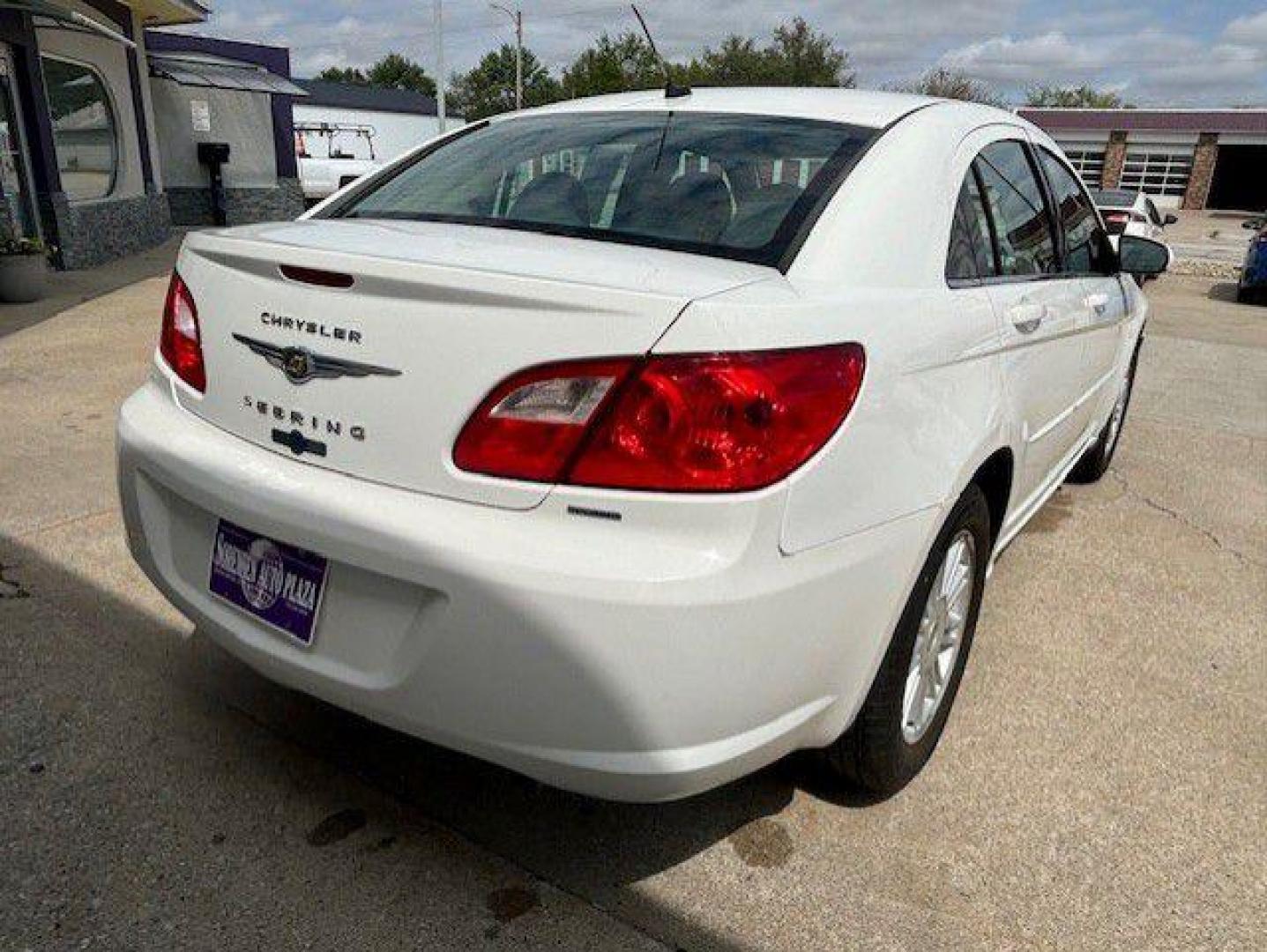 2009 WHITE CHRYSLER SEBRING TOURING (1C3LC56B19N) with an 2.4L engine, Automatic transmission, located at 1100 W. Sheridan Ave., Shenandoah, 51601, (712) 246-1600, 40.765678, -95.388817 - Photo#1