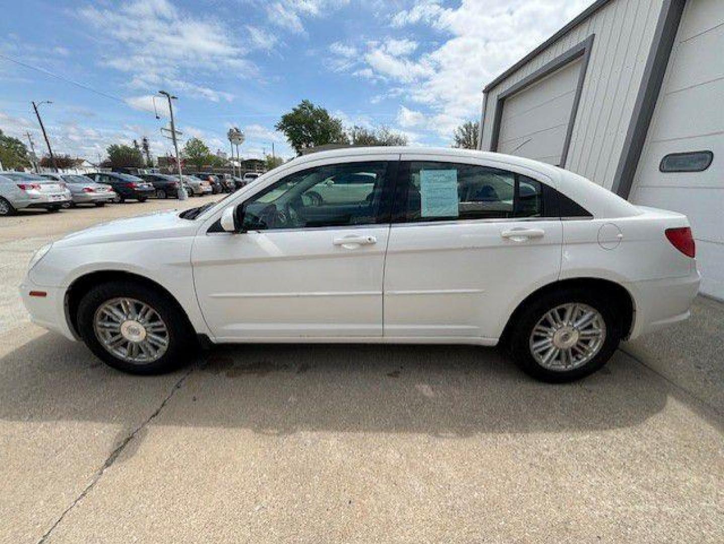 2009 WHITE CHRYSLER SEBRING TOURING (1C3LC56B19N) with an 2.4L engine, Automatic transmission, located at 1100 W. Sheridan Ave., Shenandoah, 51601, (712) 246-1600, 40.765678, -95.388817 - Photo#2