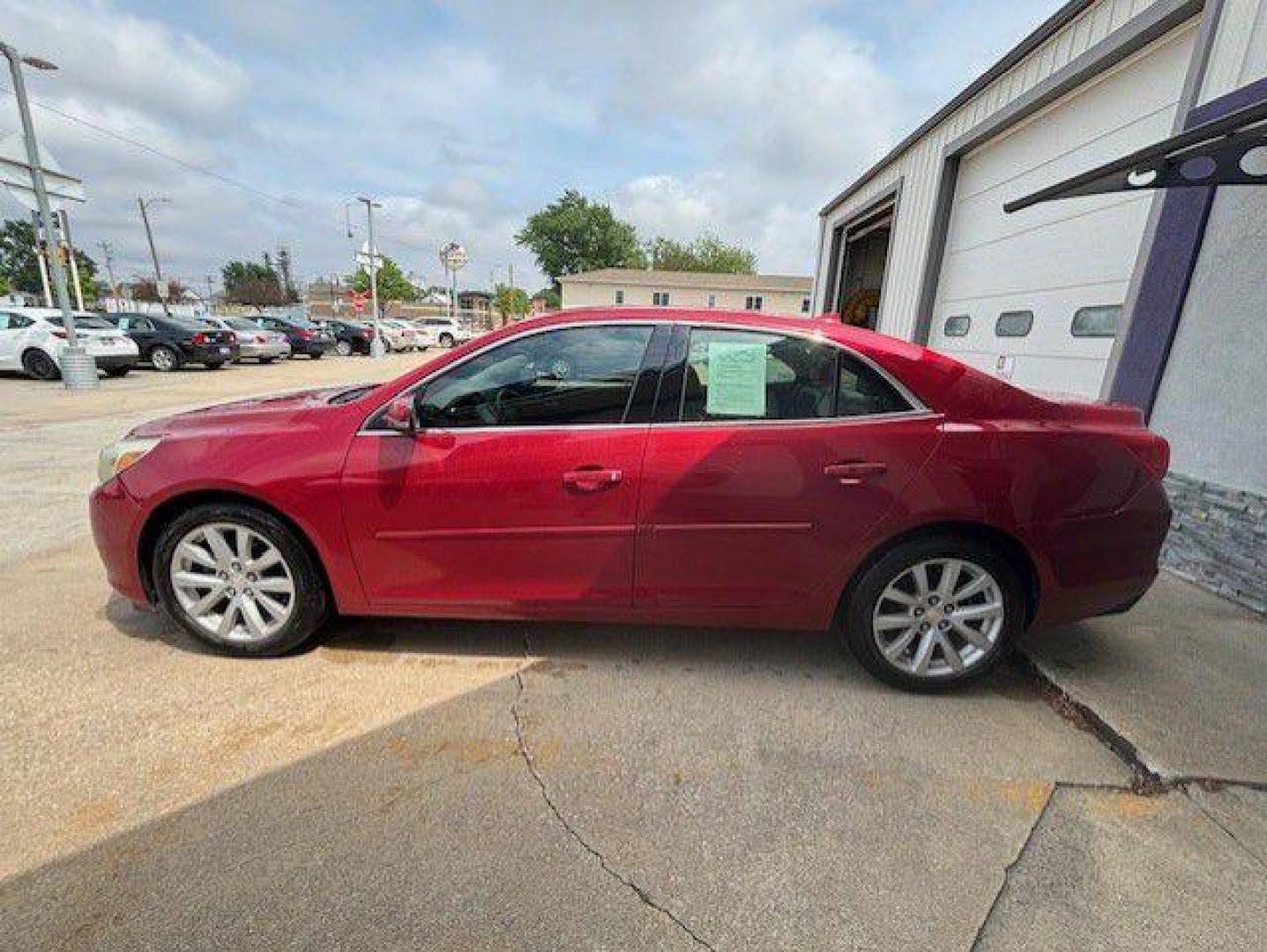 2013 RED CHEVROLET MALIBU 2LT (1G11E5SA8DF) with an 2.5L engine, Automatic transmission, located at 1100 W. Sheridan Ave., Shenandoah, 51601, (712) 246-1600, 40.765678, -95.388817 - Photo#1