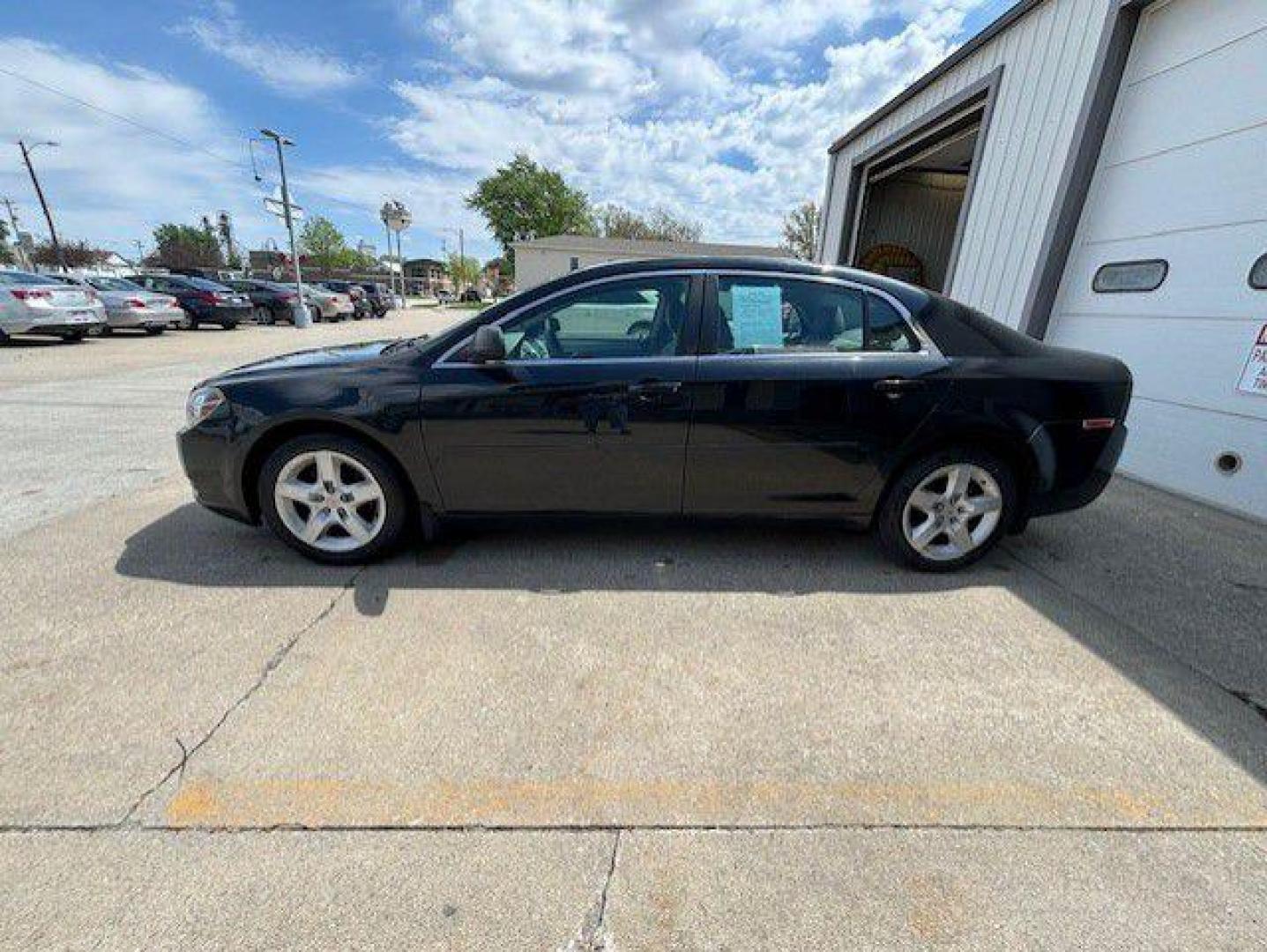 2012 BLACK CHEVROLET MALIBU LS (1G1ZB5E00CF) with an 2.4L engine, Automatic transmission, located at 1100 W. Sheridan Ave., Shenandoah, 51601, (712) 246-1600, 40.765678, -95.388817 - Photo#2