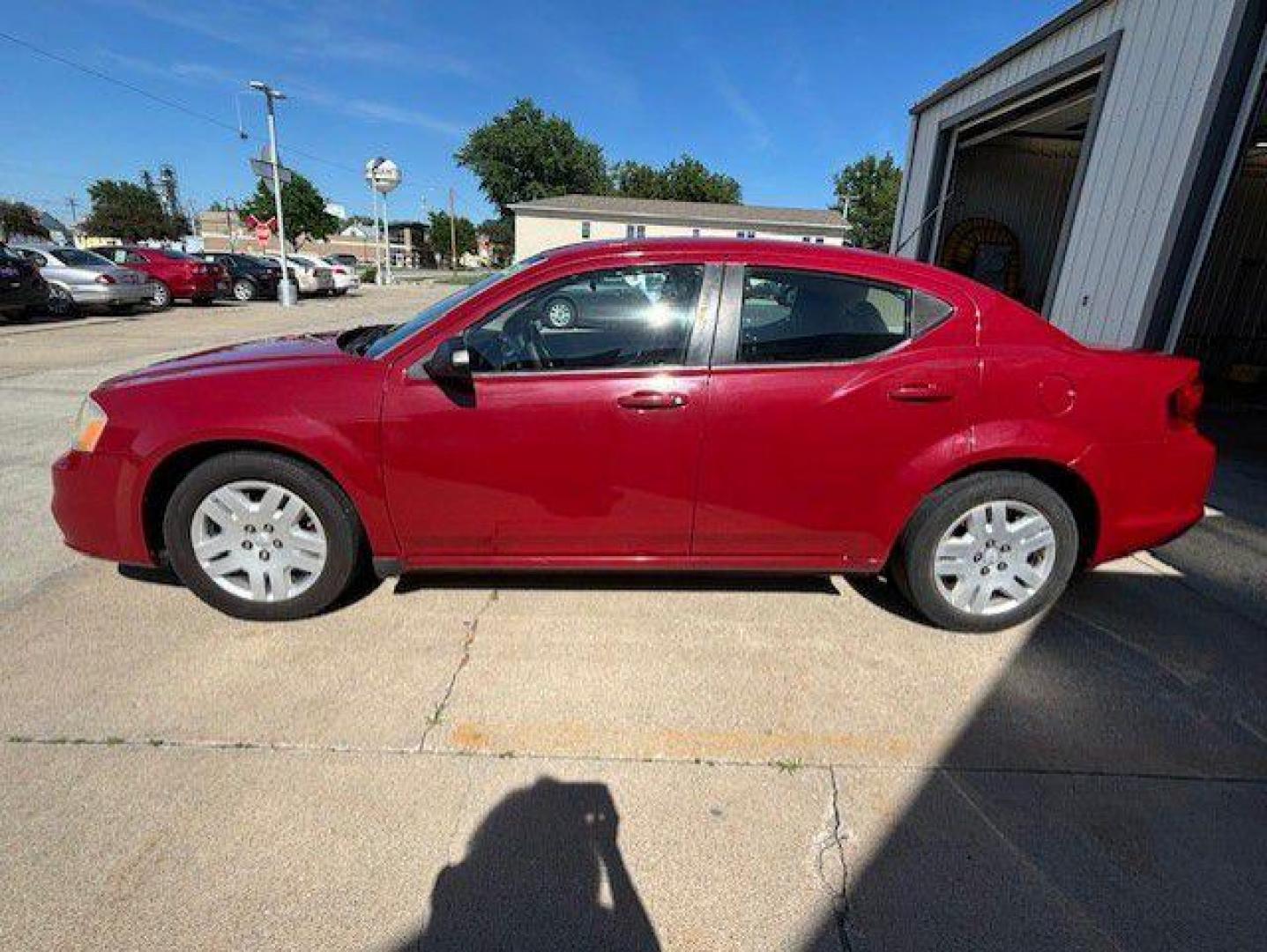 2012 RED DODGE AVENGER SE (1C3CDZABXCN) with an 2.4L engine, Automatic transmission, located at 1100 W. Sheridan Ave., Shenandoah, 51601, (712) 246-1600, 40.765678, -95.388817 - Photo#1