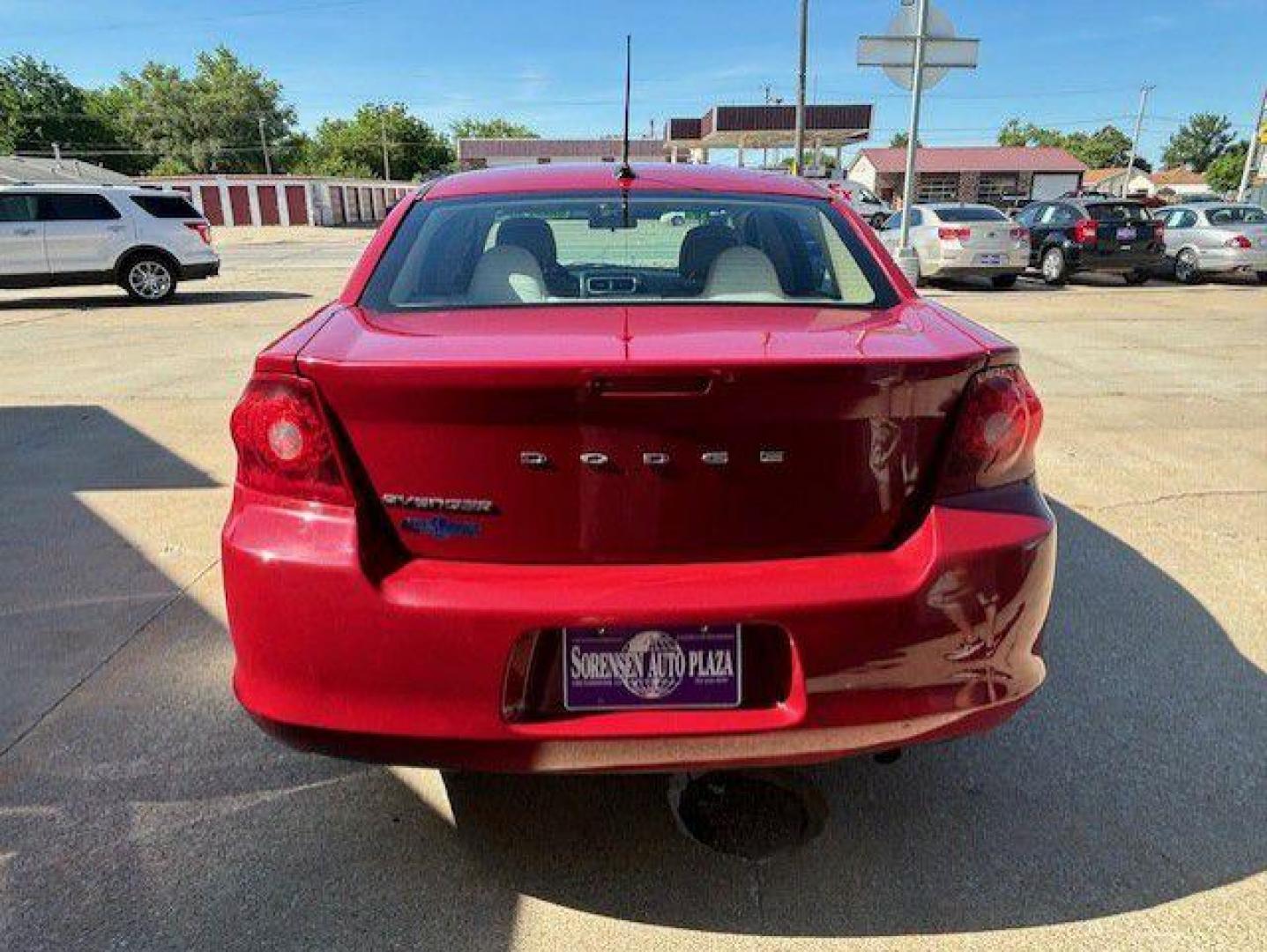 2012 RED DODGE AVENGER SE (1C3CDZABXCN) with an 2.4L engine, Automatic transmission, located at 1100 W. Sheridan Ave., Shenandoah, 51601, (712) 246-1600, 40.765678, -95.388817 - Photo#2