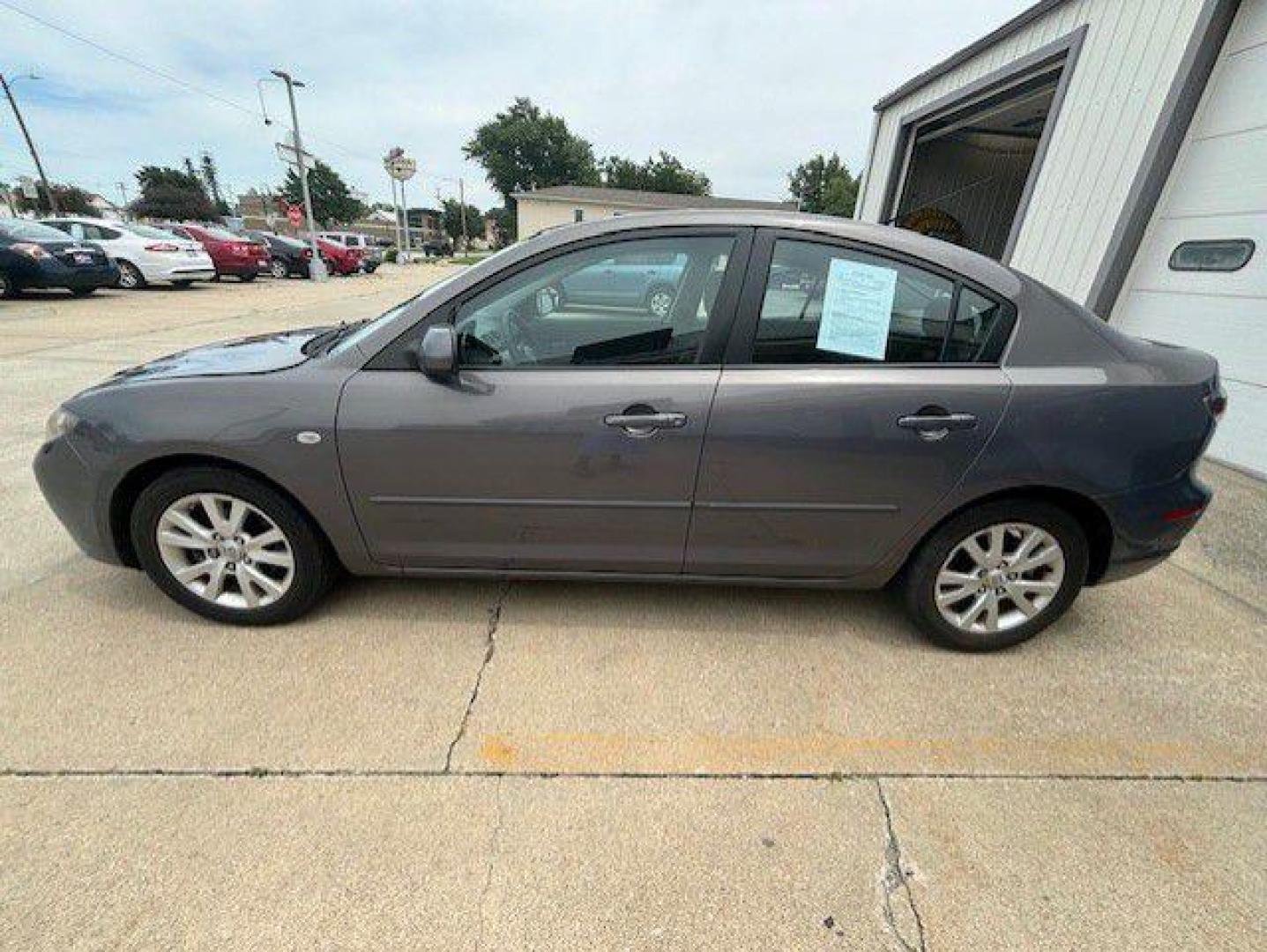 2008 GRAY MAZDA 3 I (JM1BK32F581) with an 2.0L engine, Automatic transmission, located at 1100 W. Sheridan Ave., Shenandoah, 51601, (712) 246-1600, 40.765678, -95.388817 - Photo#1