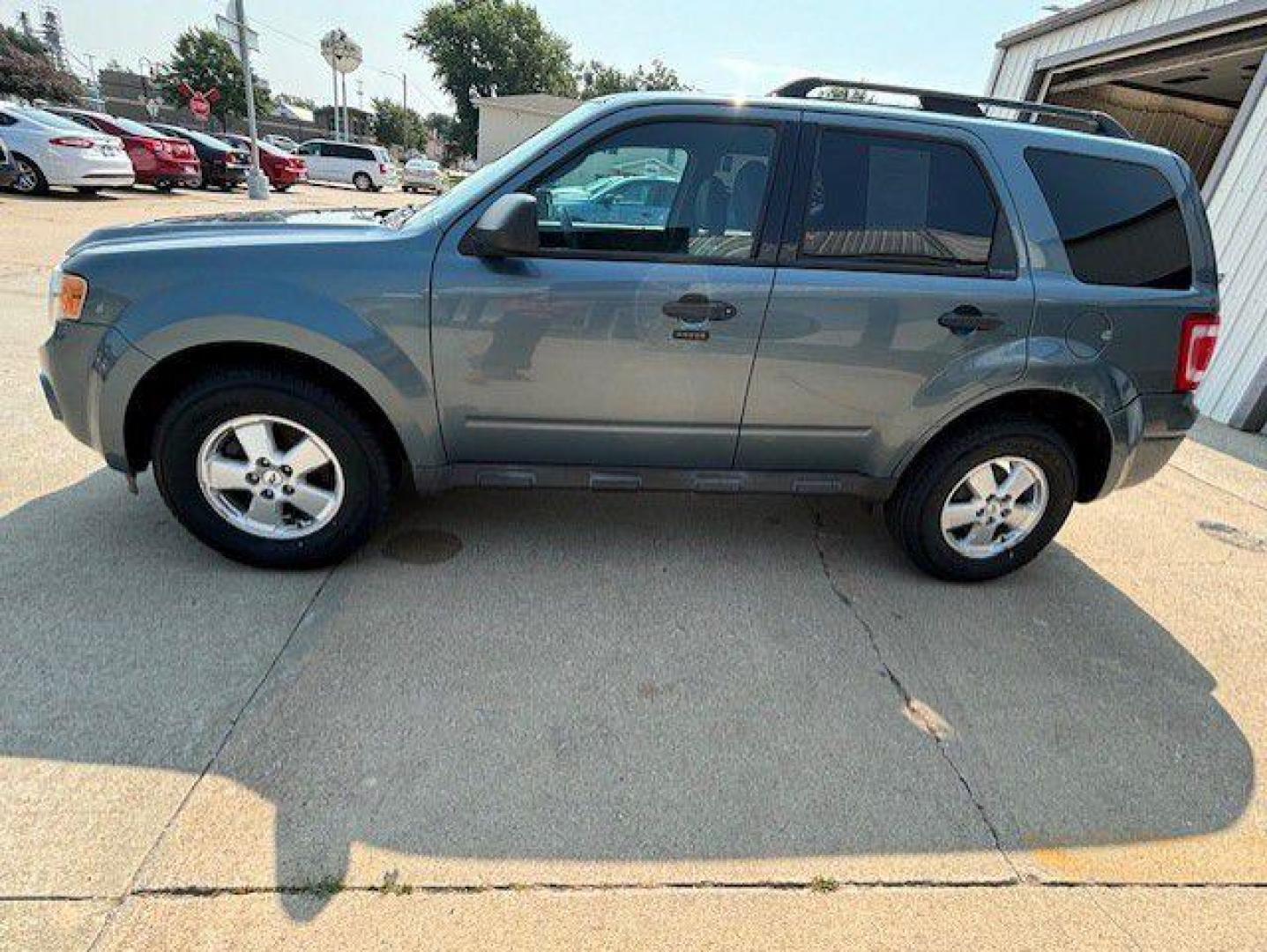 2012 BLUE FORD ESCAPE XLT (1FMCU9D71CK) with an 2.5L engine, Automatic transmission, located at 1100 W. Sheridan Ave., Shenandoah, 51601, (712) 246-1600, 40.765678, -95.388817 - Photo#1