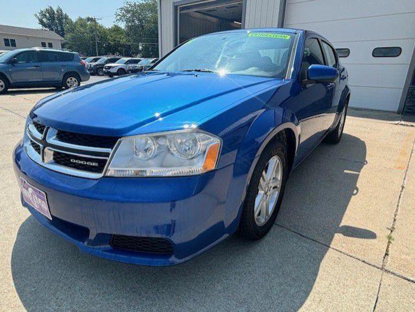 2012 BLUE DODGE AVENGER SXT (1C3CDZCB9CN) with an 2.4L engine, Automatic transmission, located at 1100 W. Sheridan Ave., Shenandoah, 51601, (712) 246-1600, 40.765678, -95.388817 - Photo#0