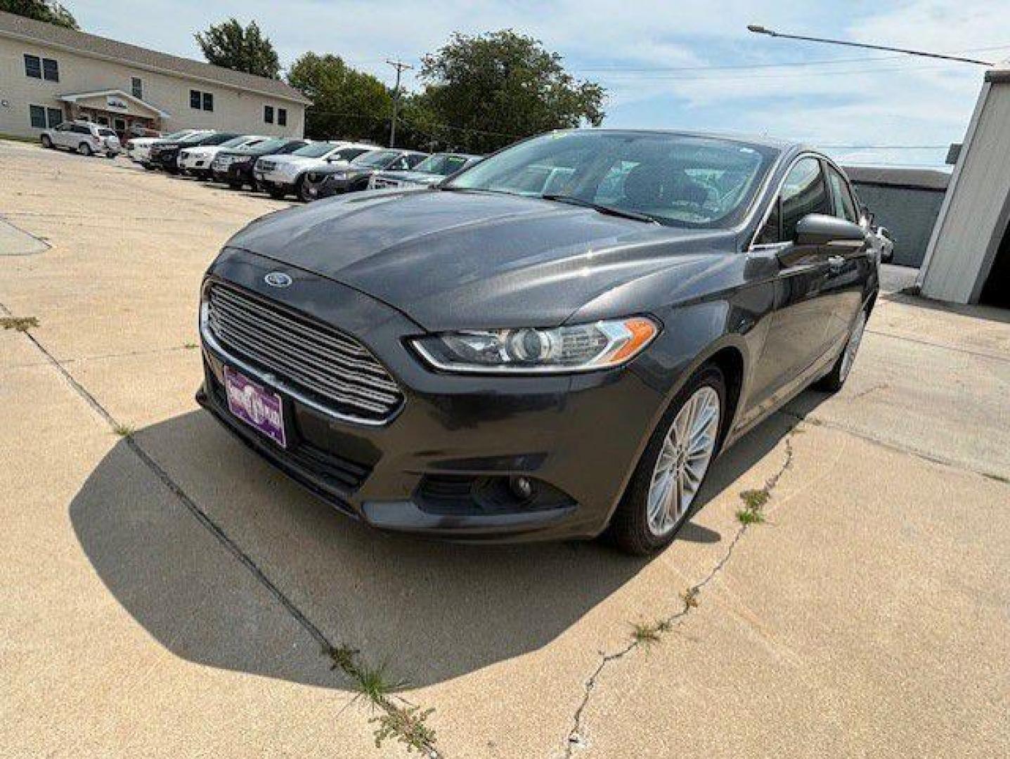 2016 GRAY FORD FUSION SE (3FA6P0T98GR) with an 2.0L engine, Automatic transmission, located at 1100 W. Sheridan Ave., Shenandoah, 51601, (712) 246-1600, 40.765678, -95.388817 - Photo#0