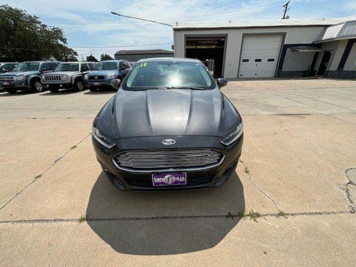 2016 GRAY FORD FUSION SE (3FA6P0T98GR) with an 2.0L engine, Automatic transmission, located at 1100 W. Sheridan Ave., Shenandoah, 51601, (712) 246-1600, 40.765678, -95.388817 - Photo#9