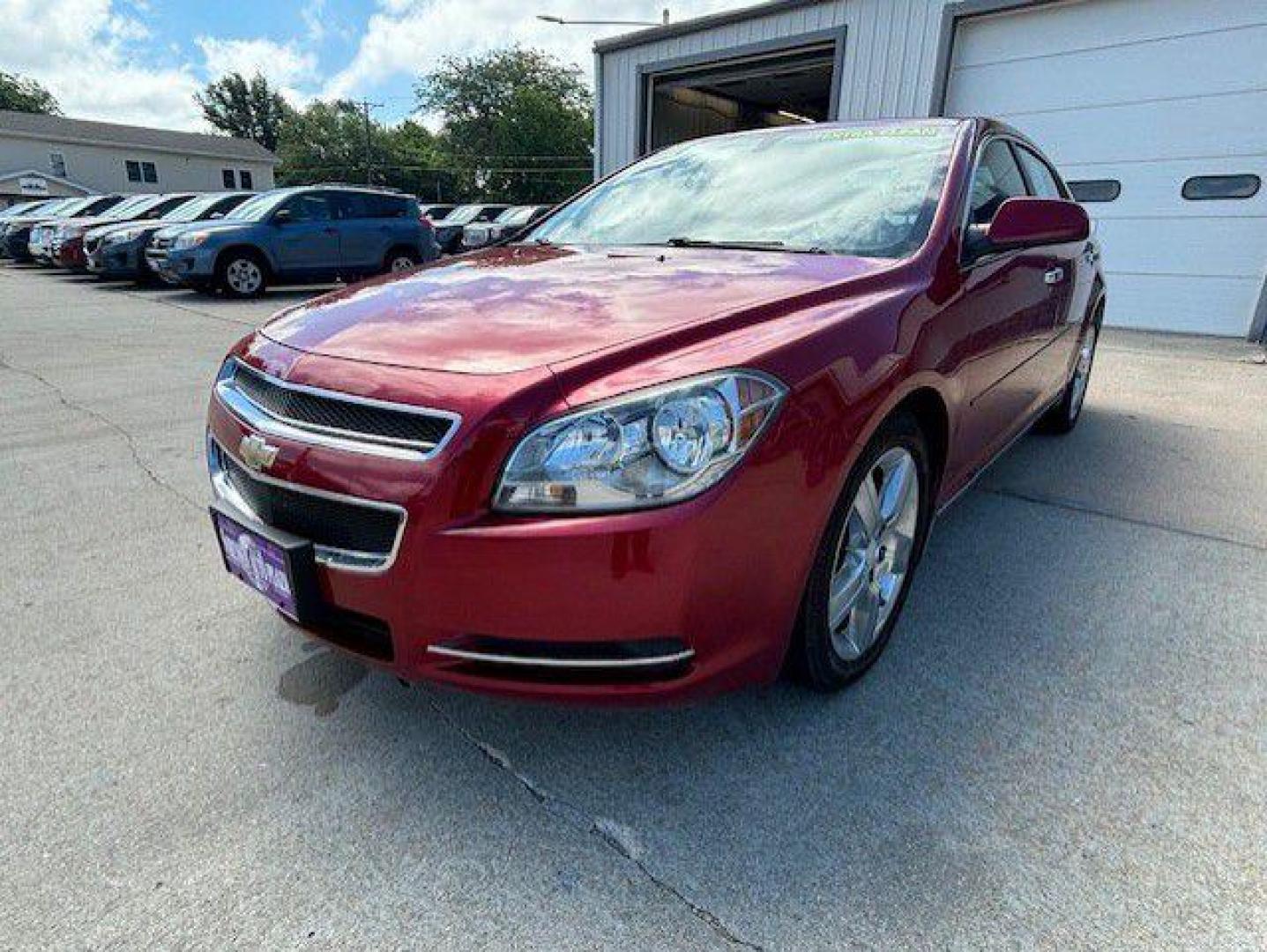 2012 RED CHEVROLET MALIBU 1LT (1G1ZC5E06CF) with an 2.4L engine, Automatic transmission, located at 1100 W. Sheridan Ave., Shenandoah, 51601, (712) 246-1600, 40.765678, -95.388817 - Photo#0