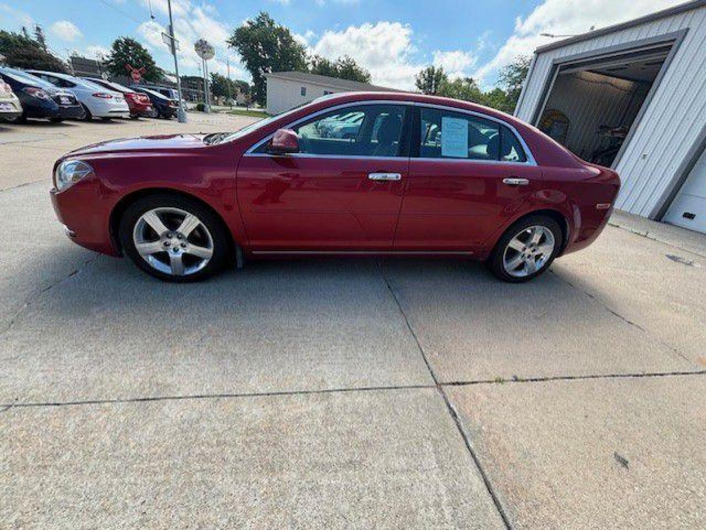 2012 RED CHEVROLET MALIBU 1LT (1G1ZC5E06CF) with an 2.4L engine, Automatic transmission, located at 1100 W. Sheridan Ave., Shenandoah, 51601, (712) 246-1600, 40.765678, -95.388817 - Photo#1