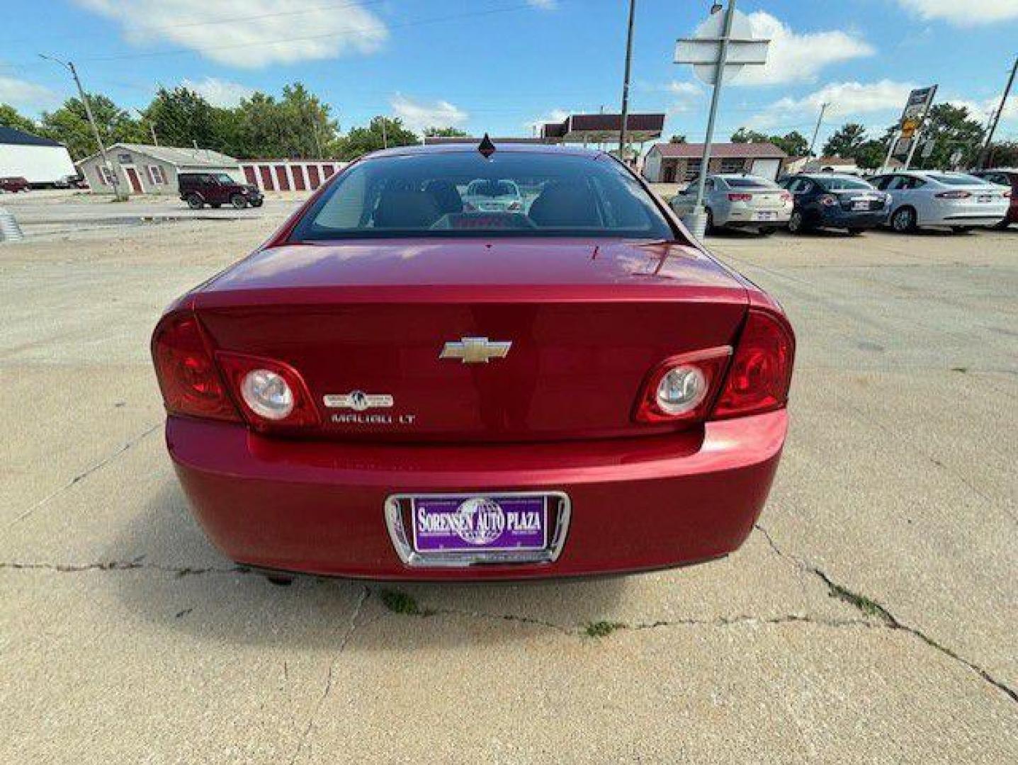 2012 RED CHEVROLET MALIBU 1LT (1G1ZC5E06CF) with an 2.4L engine, Automatic transmission, located at 1100 W. Sheridan Ave., Shenandoah, 51601, (712) 246-1600, 40.765678, -95.388817 - Photo#5