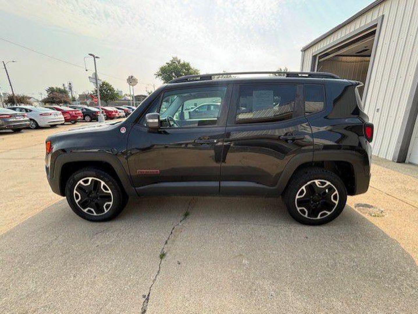 2015 BLACK JEEP RENEGADE TRAILHAWK (ZACCJBCT6FP) with an 2.4L engine, Automatic transmission, located at 1100 W. Sheridan Ave., Shenandoah, 51601, (712) 246-1600, 40.765678, -95.388817 - Photo#1