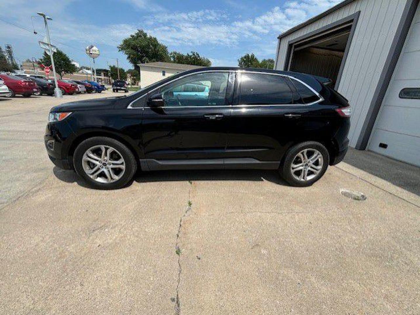 2017 BLACK FORD EDGE TITANIUM (2FMPK4K92HB) with an 2.0L engine, Automatic transmission, located at 1100 W. Sheridan Ave., Shenandoah, 51601, (712) 246-1600, 40.765678, -95.388817 - Photo#1