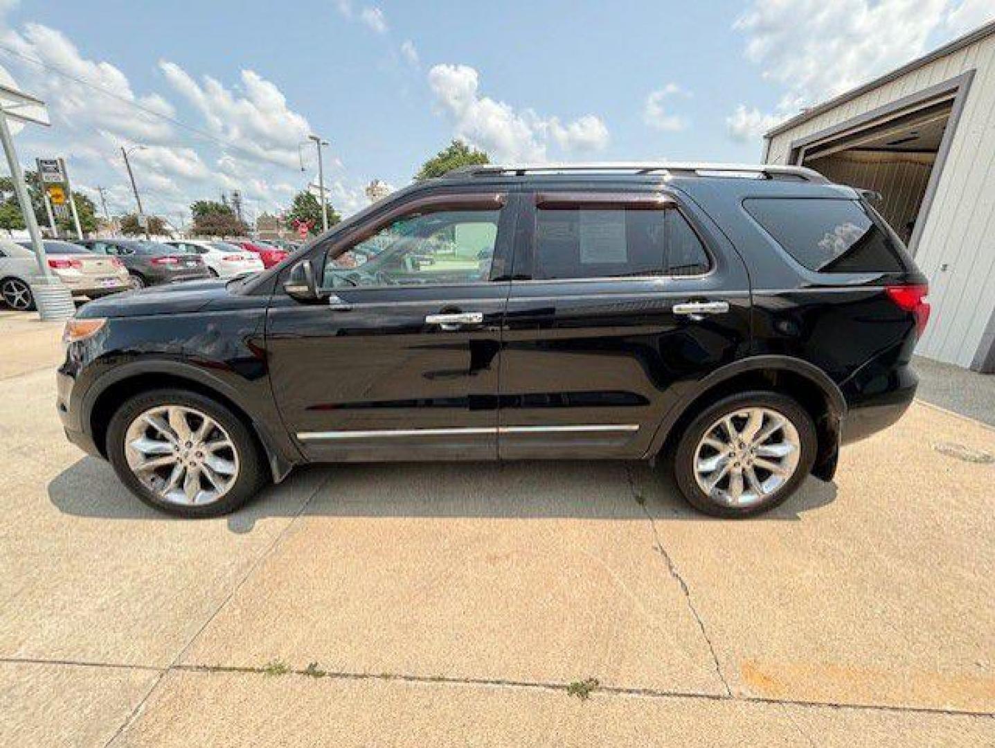 2012 BLACK FORD EXPLORER XLT (1FMHK8D84CG) with an 3.5L engine, Automatic transmission, located at 1100 W. Sheridan Ave., Shenandoah, 51601, (712) 246-1600, 40.765678, -95.388817 - Photo#1