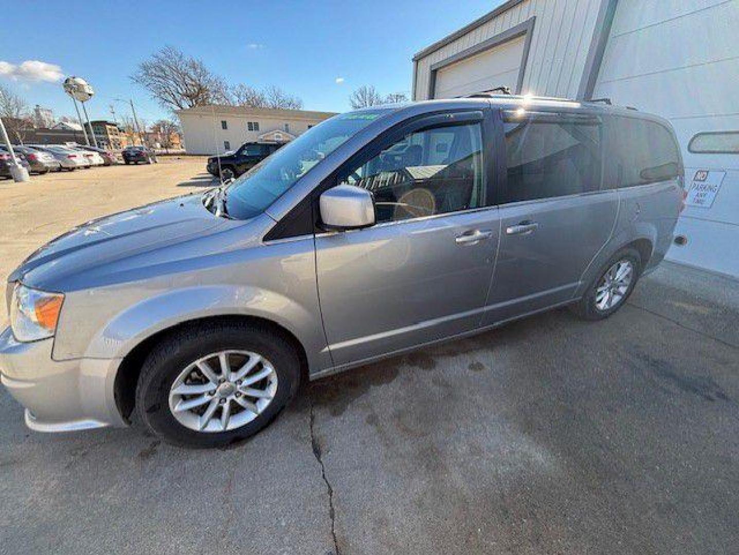 2018 SILVER DODGE GRAND CARAVAN SXT (2C4RDGCG6JR) with an 3.6L engine, Automatic transmission, located at 1100 W. Sheridan Ave., Shenandoah, 51601, (712) 246-1600, 40.765678, -95.388817 - Photo#1