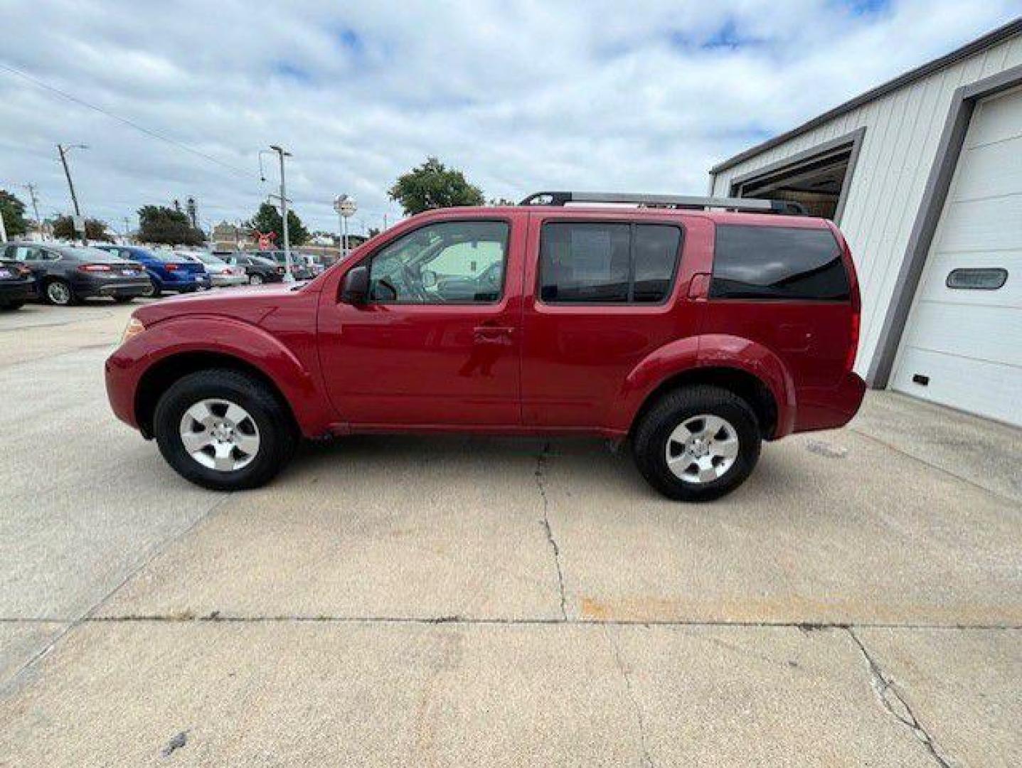 2010 RED NISSAN PATHFINDER S (5N1AR1NB3AC) with an 4.0L engine, Automatic transmission, located at 1100 W. Sheridan Ave., Shenandoah, 51601, (712) 246-1600, 40.765678, -95.388817 - Photo#1