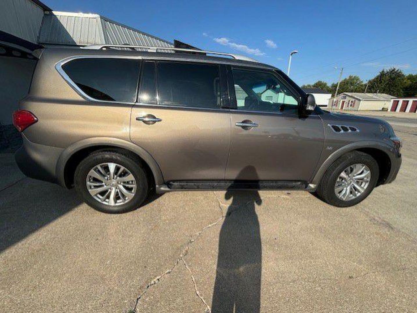 2015 BROWN INFINITI QX80 (JN8AZ2NE9F9) with an 5.6L engine, Automatic transmission, located at 1100 W. Sheridan Ave., Shenandoah, 51601, (712) 246-1600, 40.765678, -95.388817 - Photo#8