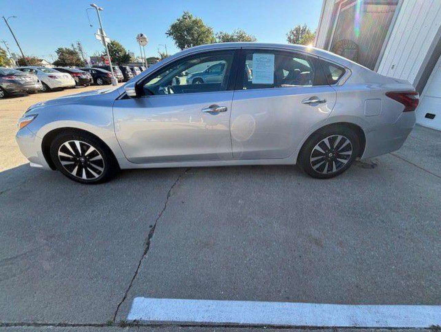 2018 SILVER NISSAN ALTIMA 2.5 (1N4AL3AP3JC) with an 2.5L engine, Continuously Variable transmission, located at 1100 W. Sheridan Ave., Shenandoah, 51601, (712) 246-1600, 40.765678, -95.388817 - Photo#1