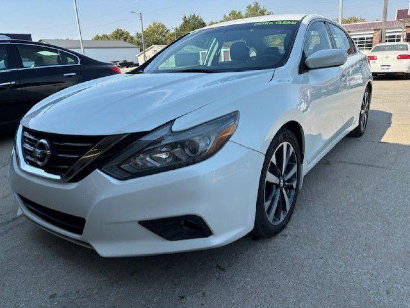 2017 WHITE NISSAN ALTIMA 2.5 (1N4AL3AP5HC) with an 2.5L engine, Continuously Variable transmission, located at 1100 W. Sheridan Ave., Shenandoah, 51601, (712) 246-1600, 40.765678, -95.388817 - Photo#0