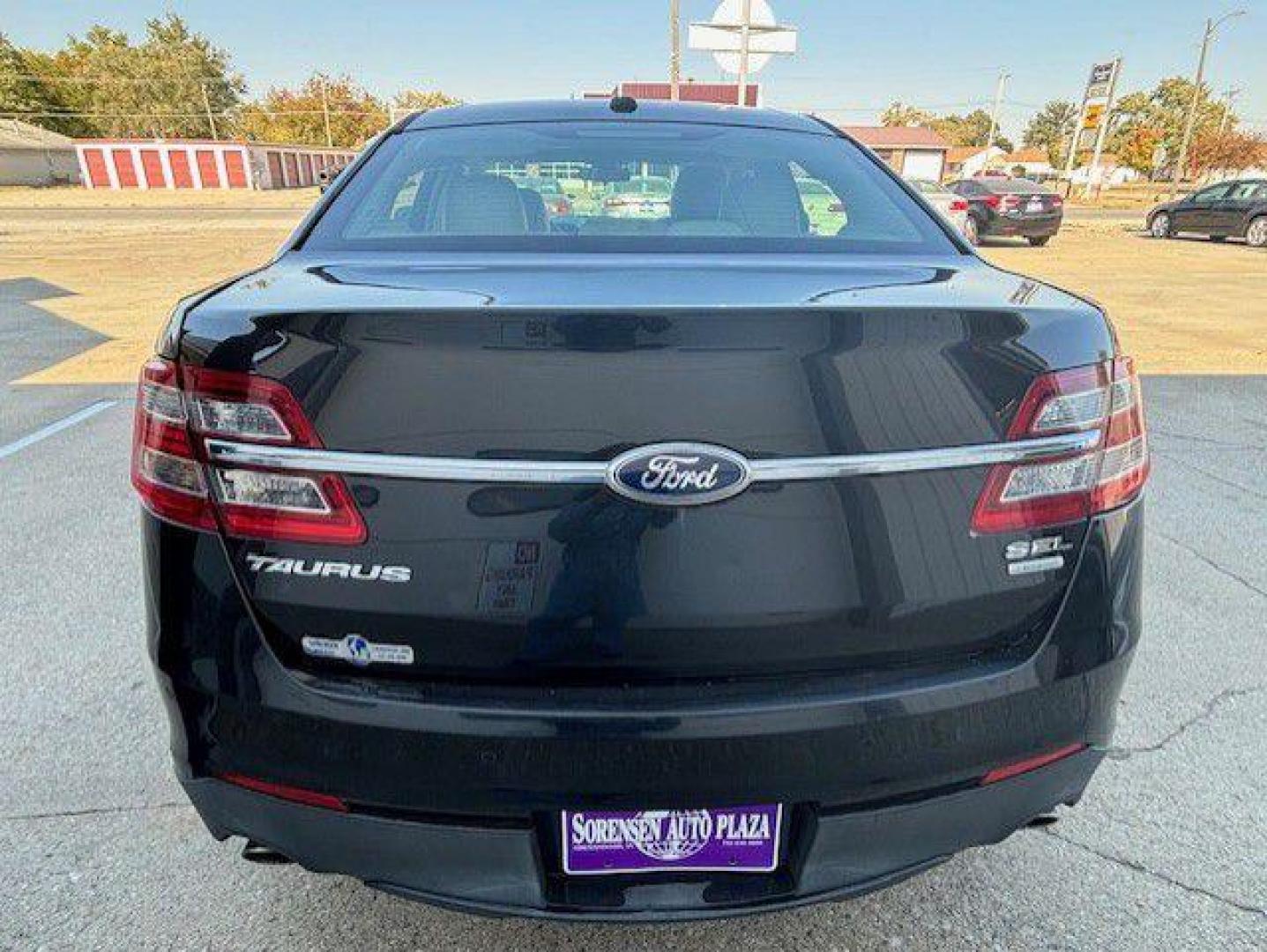 2013 BLACK FORD TAURUS SEL (1FAHP2E96DG) with an 2.0L engine, Automatic transmission, located at 1100 W. Sheridan Ave., Shenandoah, 51601, (712) 246-1600, 40.765678, -95.388817 - Photo#5