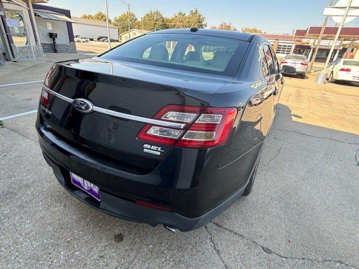 2013 BLACK FORD TAURUS SEL (1FAHP2E96DG) with an 2.0L engine, Automatic transmission, located at 1100 W. Sheridan Ave., Shenandoah, 51601, (712) 246-1600, 40.765678, -95.388817 - Photo#6