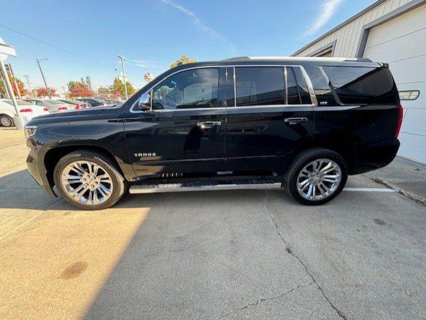 2015 BLACK CHEVROLET TAHOE 1500 LTZ (1GNSKCKC0FR) with an 5.3L engine, Automatic transmission, located at 1100 W. Sheridan Ave., Shenandoah, 51601, (712) 246-1600, 40.765678, -95.388817 - Photo#9