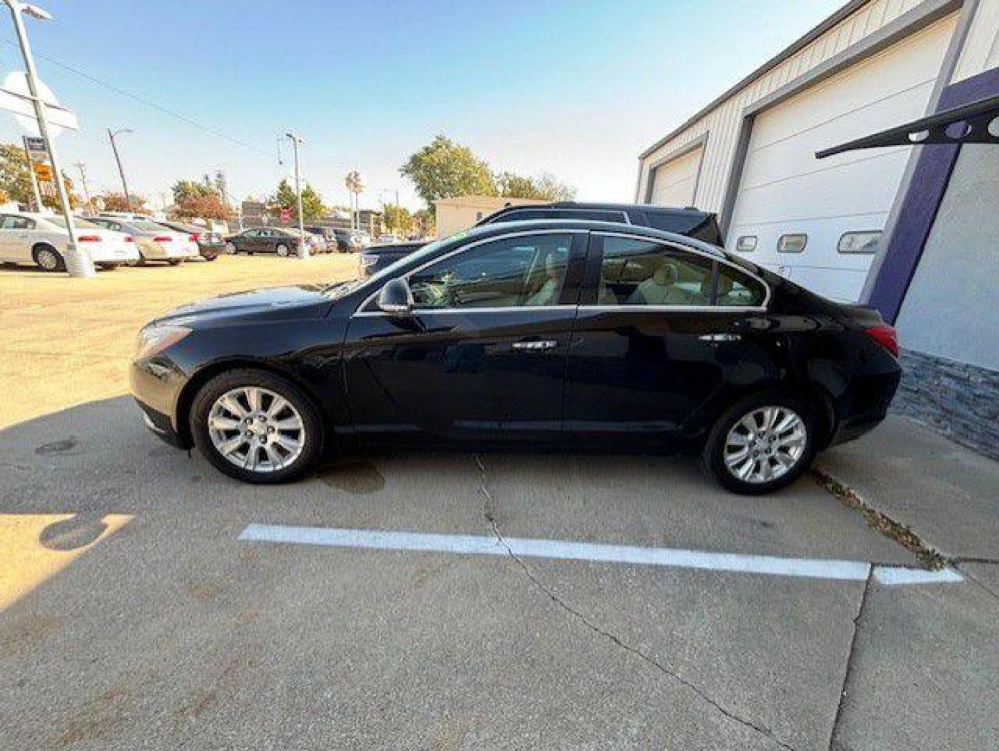 2012 BLACK BUICK REGAL PREMIUM (2G4GT5GR6C9) with an 2.4L engine, Automatic transmission, located at 1100 W. Sheridan Ave., Shenandoah, 51601, (712) 246-1600, 40.765678, -95.388817 - Photo#1