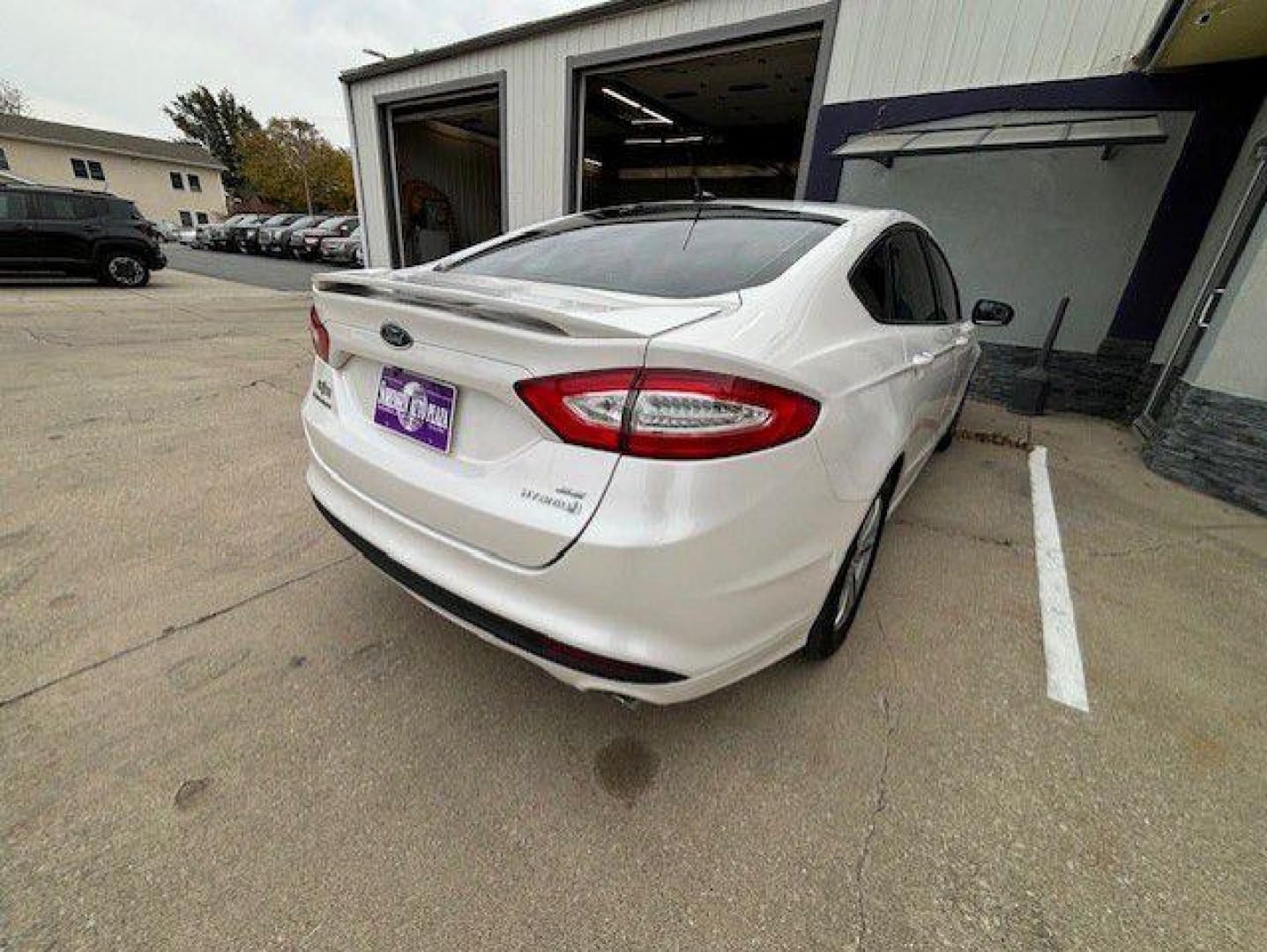 2015 WHITE FORD FUSION SE HYBRID (3FA6P0LU1FR) with an 2.0L engine, Continuously Variable transmission, located at 1100 W. Sheridan Ave., Shenandoah, 51601, (712) 246-1600, 40.765678, -95.388817 - Photo#6