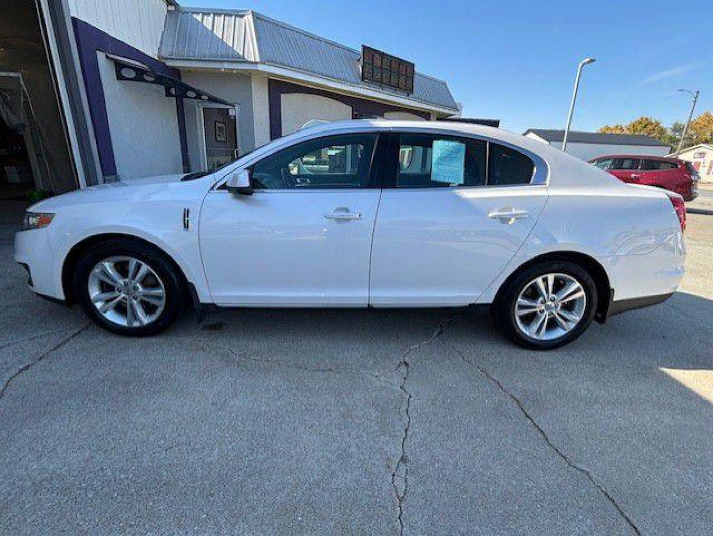 2010 WHITE LINCOLN MKS (1LNHL9DR8AG) with an 3.7L engine, Automatic transmission, located at 1100 W. Sheridan Ave., Shenandoah, 51601, (712) 246-1600, 40.765678, -95.388817 - Photo#1