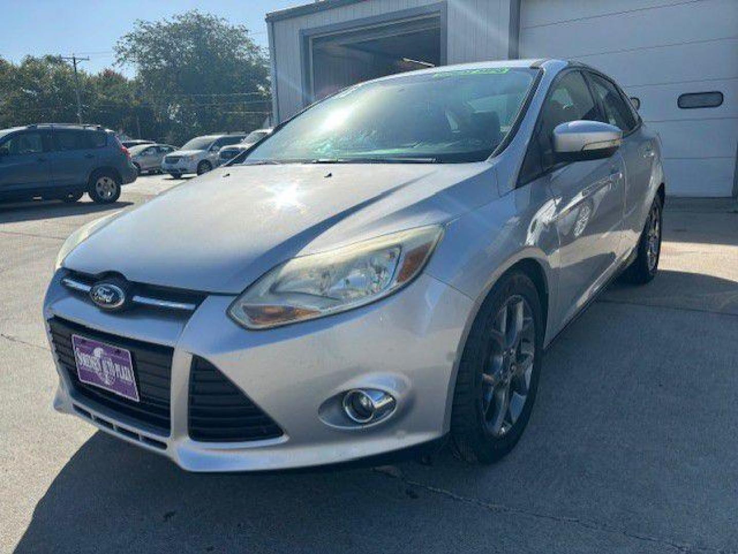 2013 SILVER FORD FOCUS SE (1FADP3F29DL) with an 2.0L engine, Automatic transmission, located at 1100 W. Sheridan Ave., Shenandoah, 51601, (712) 246-1600, 40.765678, -95.388817 - Photo#0