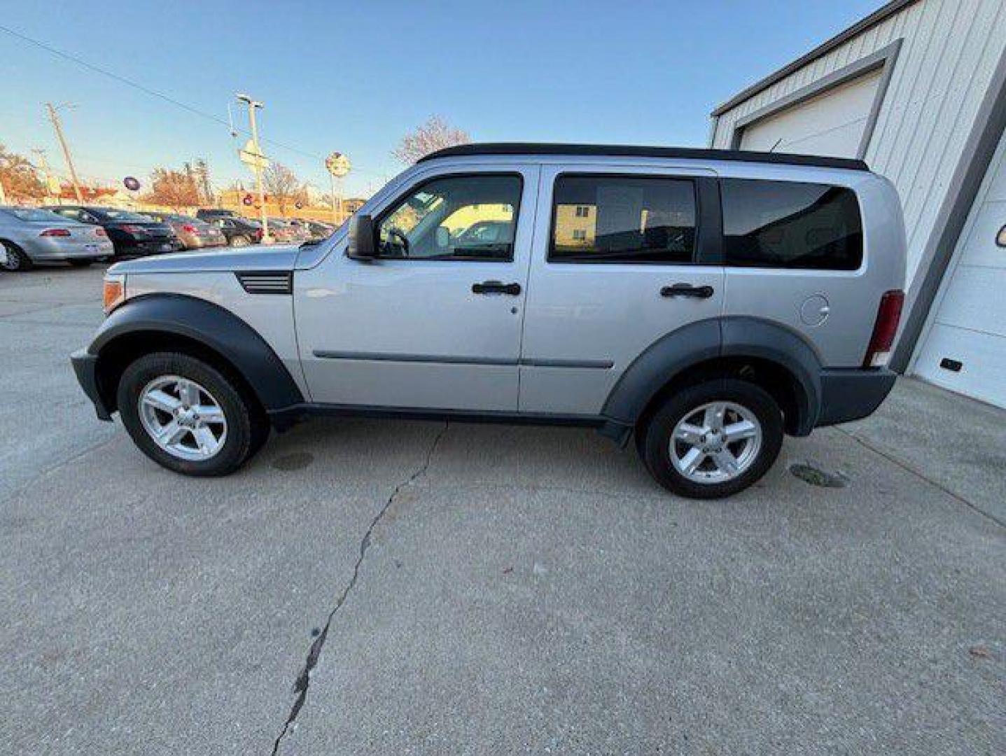 2007 SILVER DODGE NITRO SXT (1D8GT28K37W) with an 3.7L engine, Automatic transmission, located at 1100 W. Sheridan Ave., Shenandoah, 51601, (712) 246-1600, 40.765678, -95.388817 - Photo#1