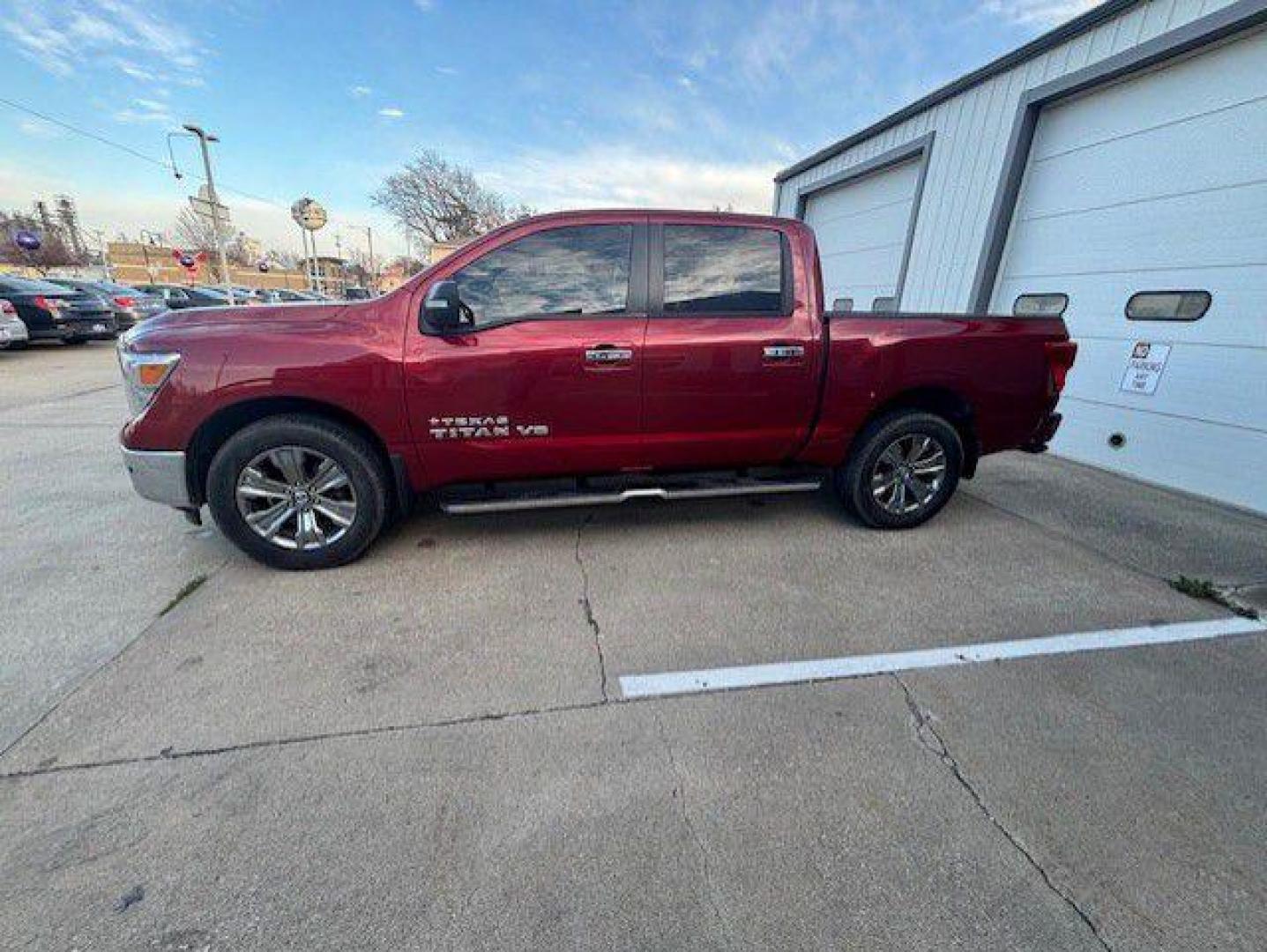 2019 RED NISSAN TITAN SV (1N6AA1E59KN) with an 5.6L engine, Automatic transmission, located at 1100 W. Sheridan Ave., Shenandoah, 51601, (712) 246-1600, 40.765678, -95.388817 - Photo#1