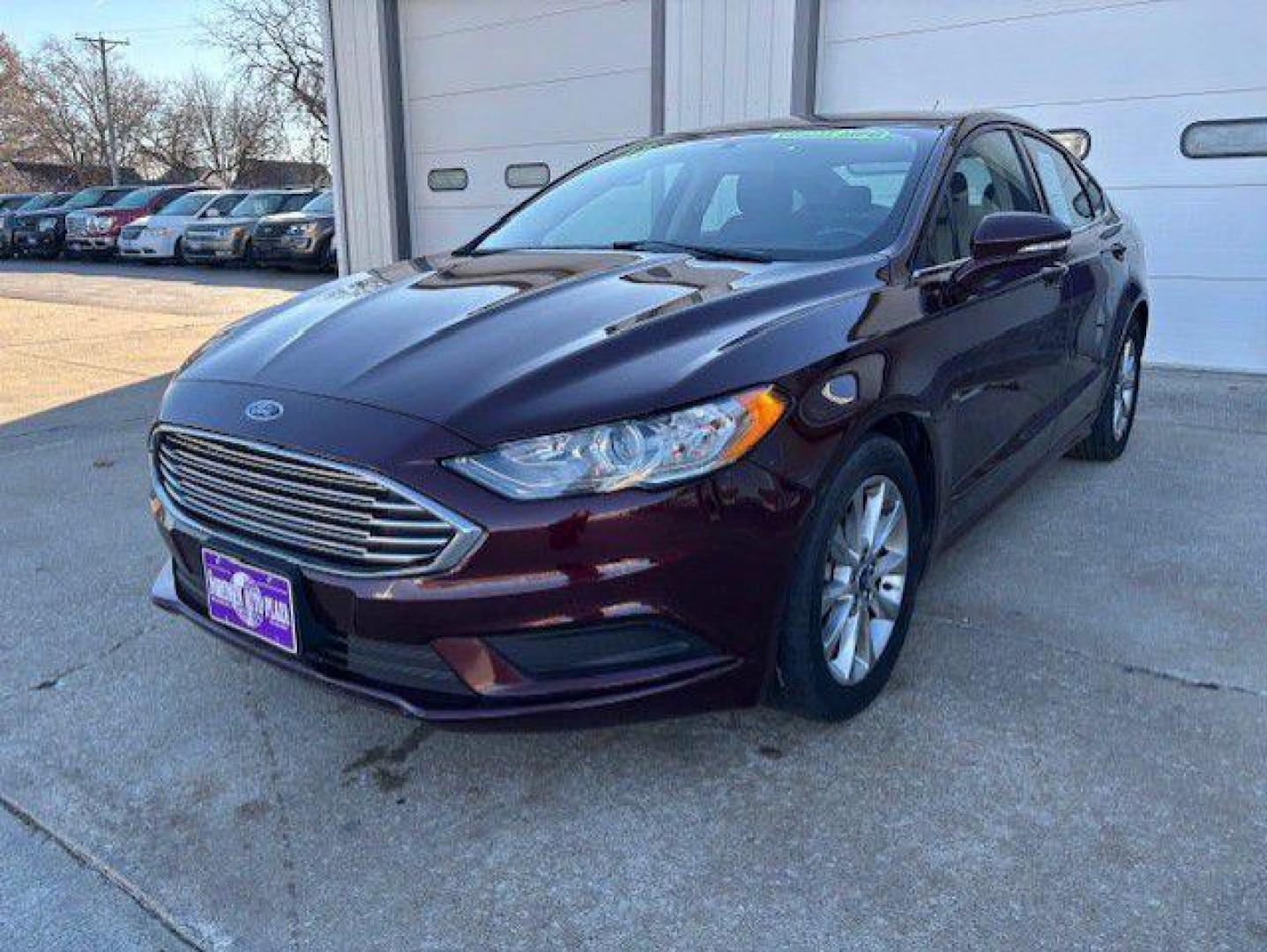 2017 MAROON FORD FUSION SE (3FA6P0H72HR) with an 2.5L engine, Automatic transmission, located at 1100 W. Sheridan Ave., Shenandoah, 51601, (712) 246-1600, 40.765678, -95.388817 - Photo#0