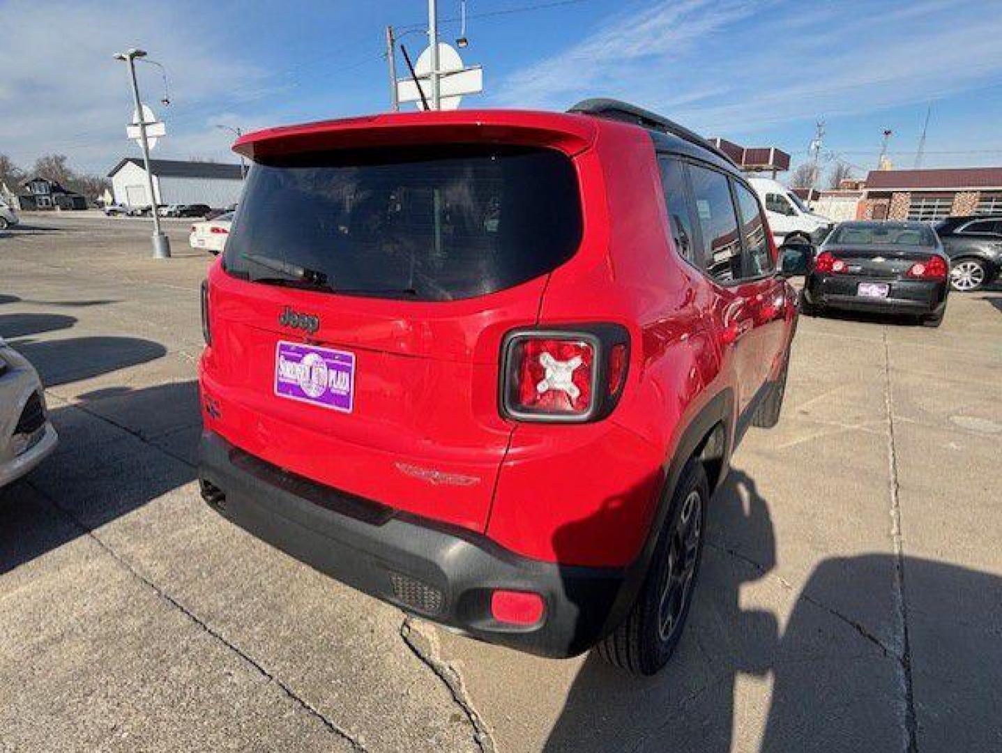 2015 RED JEEP RENEGADE TRAILHAWK (ZACCJBCTXFP) with an 2.4L engine, Automatic transmission, located at 1100 W. Sheridan Ave., Shenandoah, 51601, (712) 246-1600, 40.765678, -95.388817 - Photo#6